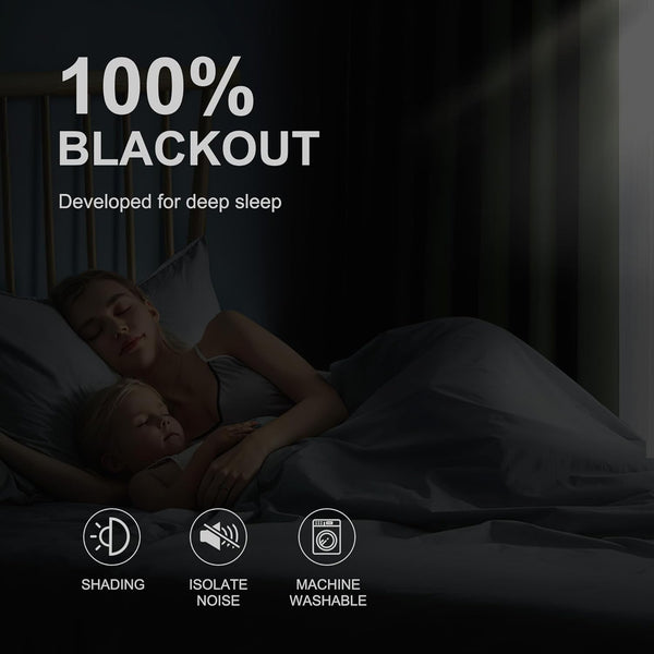 Mother and child sleeping soundly in a dark room, highlighting 100% blackout for deep sleep.
