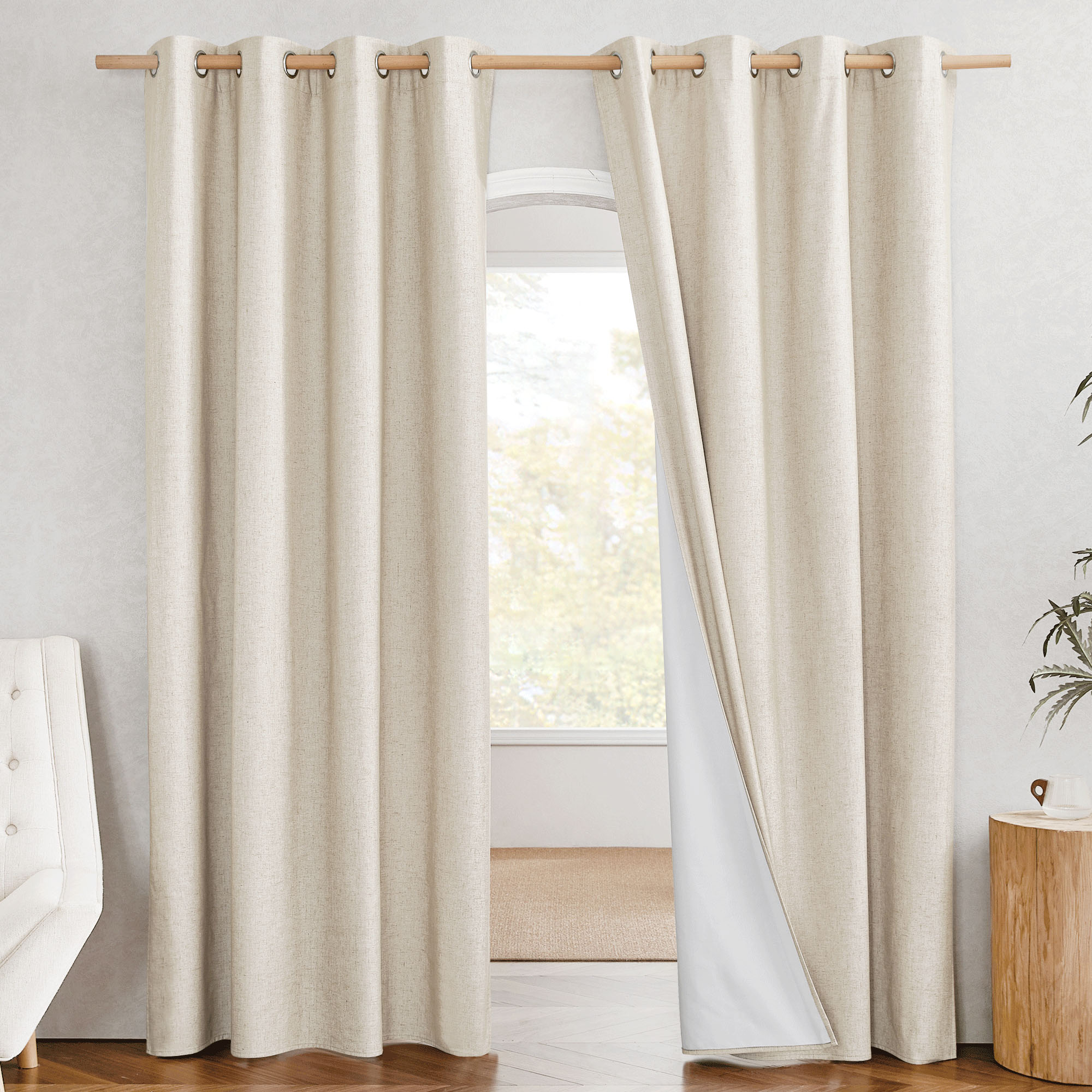 Beige linen blackout curtains on a rod. The right panel is pulled back, showing the white 100% blackout liner.