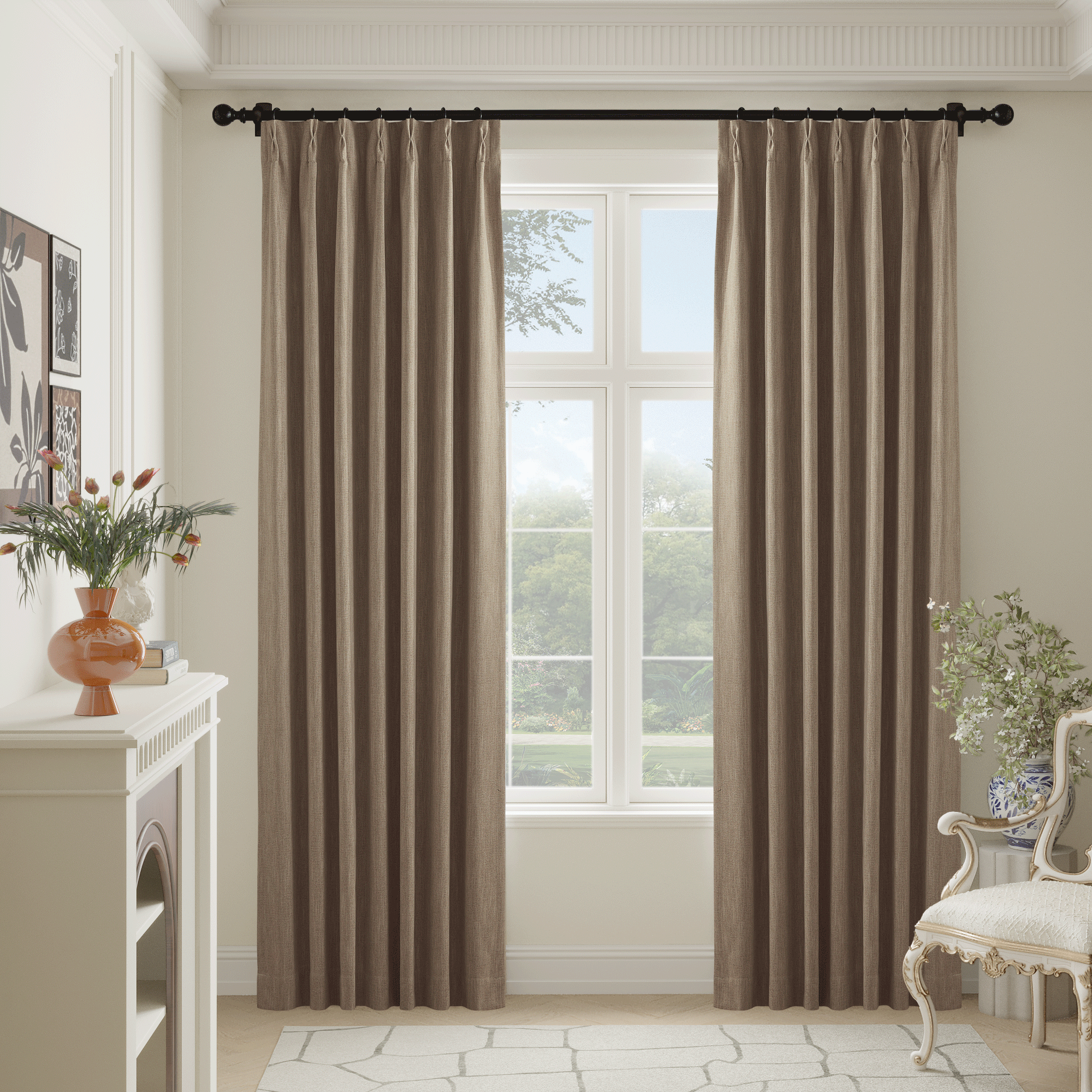 Valentina Natural 100% full blackout faux linen curtains in warm taupe, fully drawn on a black rod in a bright room.