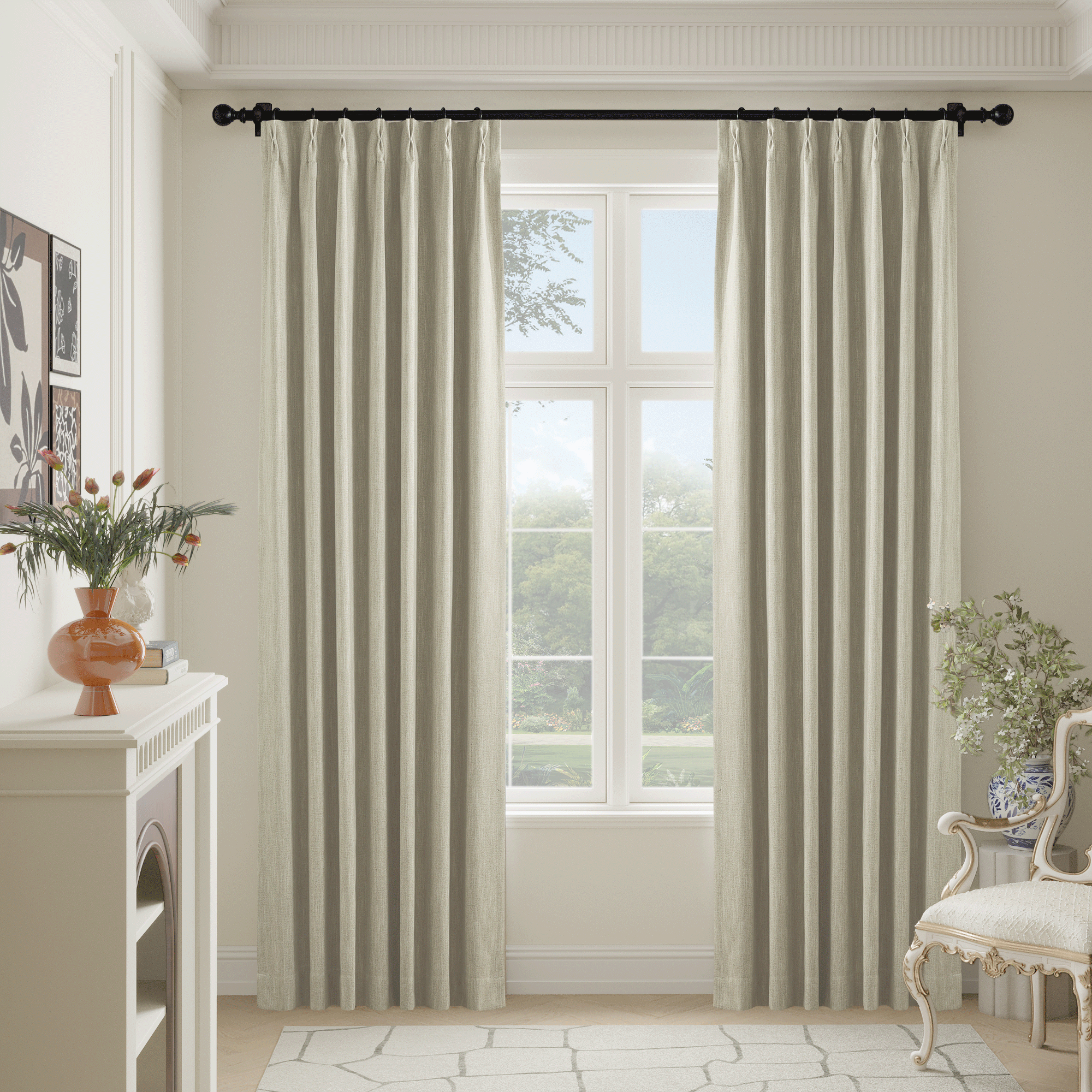 Natural faux linen blackout curtains with elegant pleats hanging from a black rod, framing a bright window in a room.