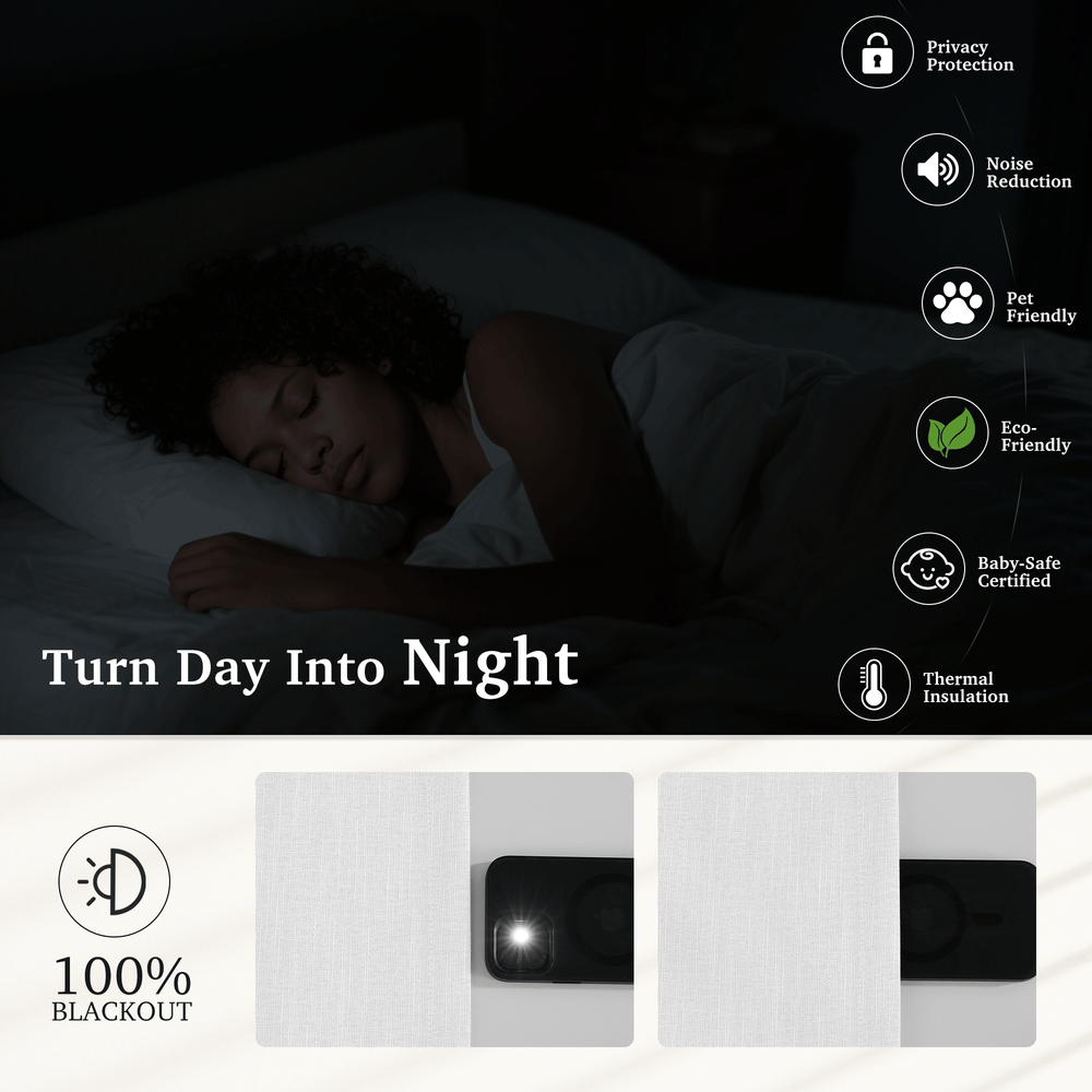 White Valentina Natural full blackout faux linen pinch pleated curtains drawn across a window in a bright room.