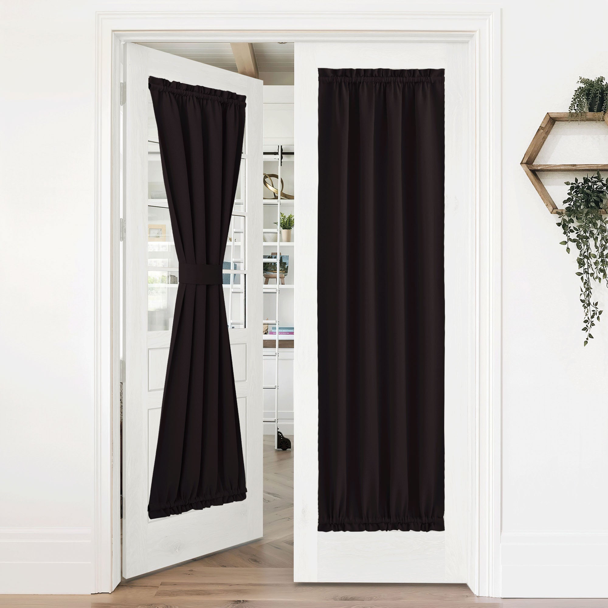 Black 50% blackout privacy door curtains on white French doors. One tied back to allow light, the other fully closed for privacy.