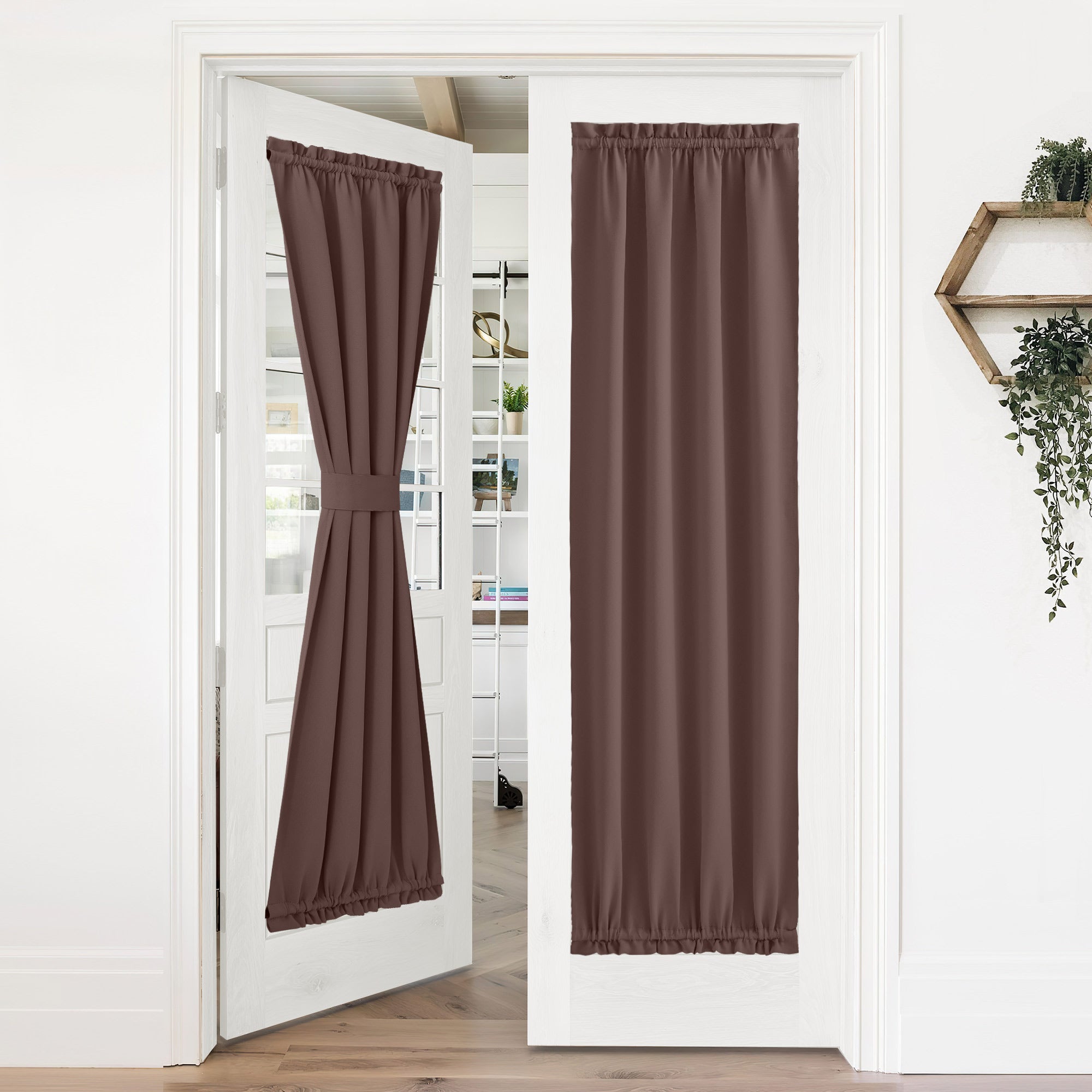 Brown 50% blackout privacy door curtains on white French doors; one curtain is tied back, the other fully covers the glass.
