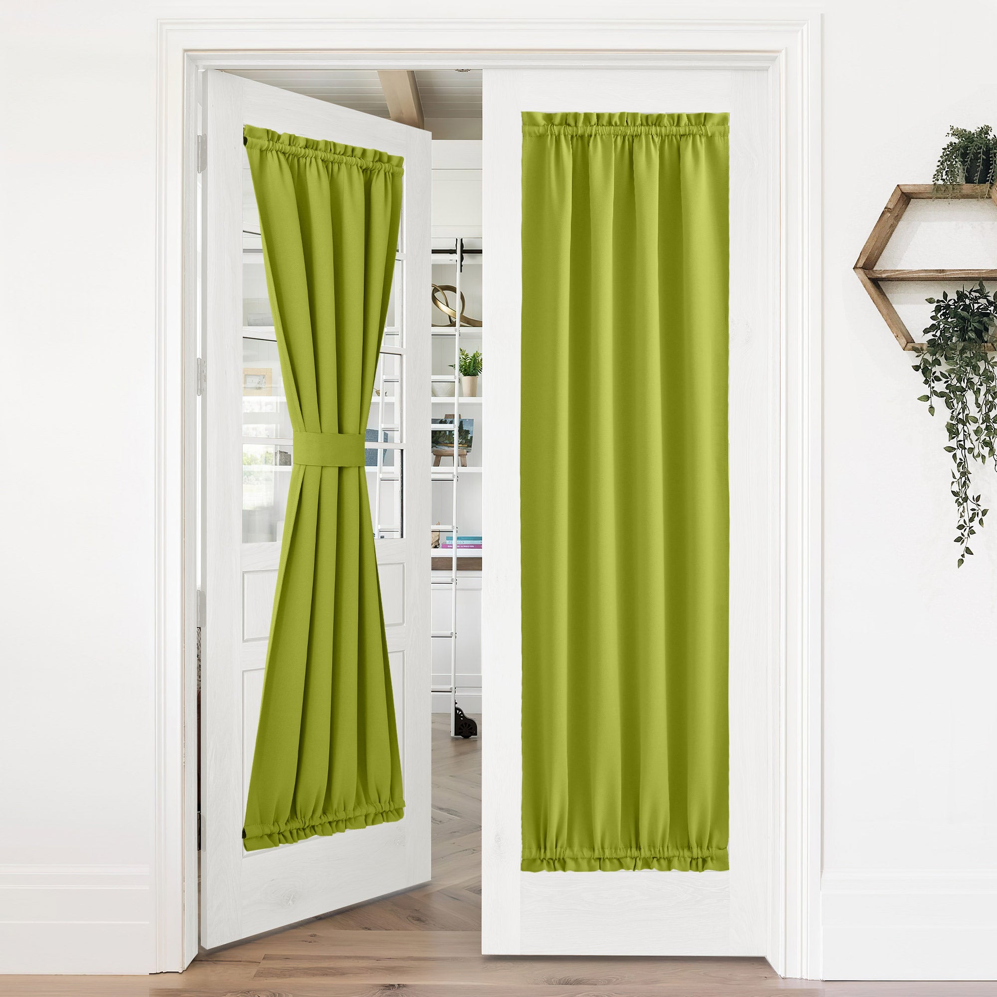 Green 50% blackout privacy door curtains on white French doors; one panel tied back, one fully closed.