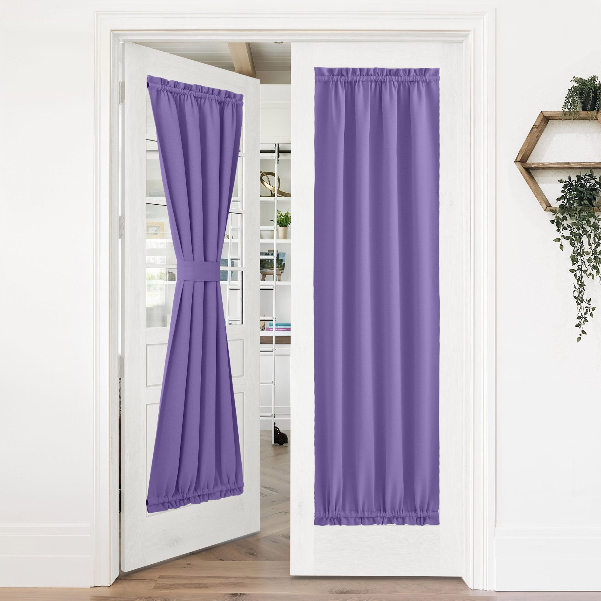 Purple 50% blackout privacy door curtains on white French doors. One curtain tied back, the other fully covers for privacy.