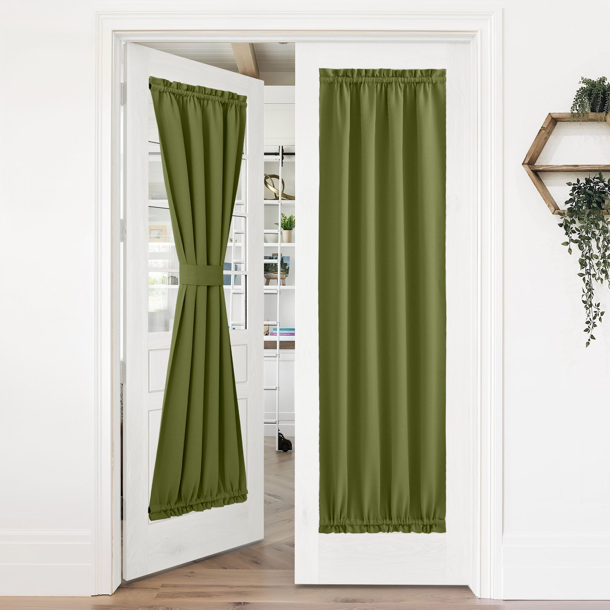Green 50% blackout privacy door curtains on white French doors; one tied back, the other fully covers the glass.
