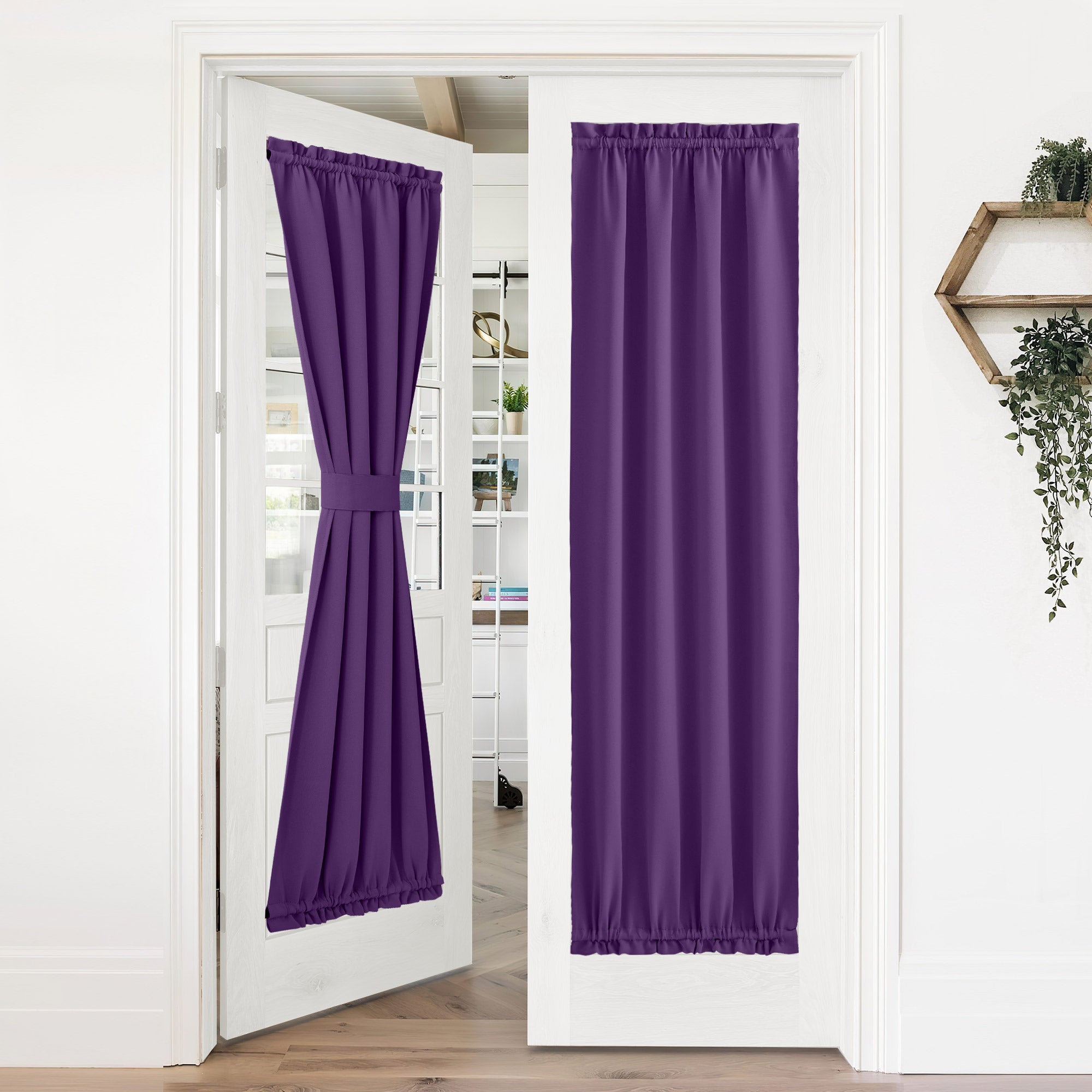 Purple 50% blackout door curtains on white French doors; one tied back, the other fully closed for privacy.
