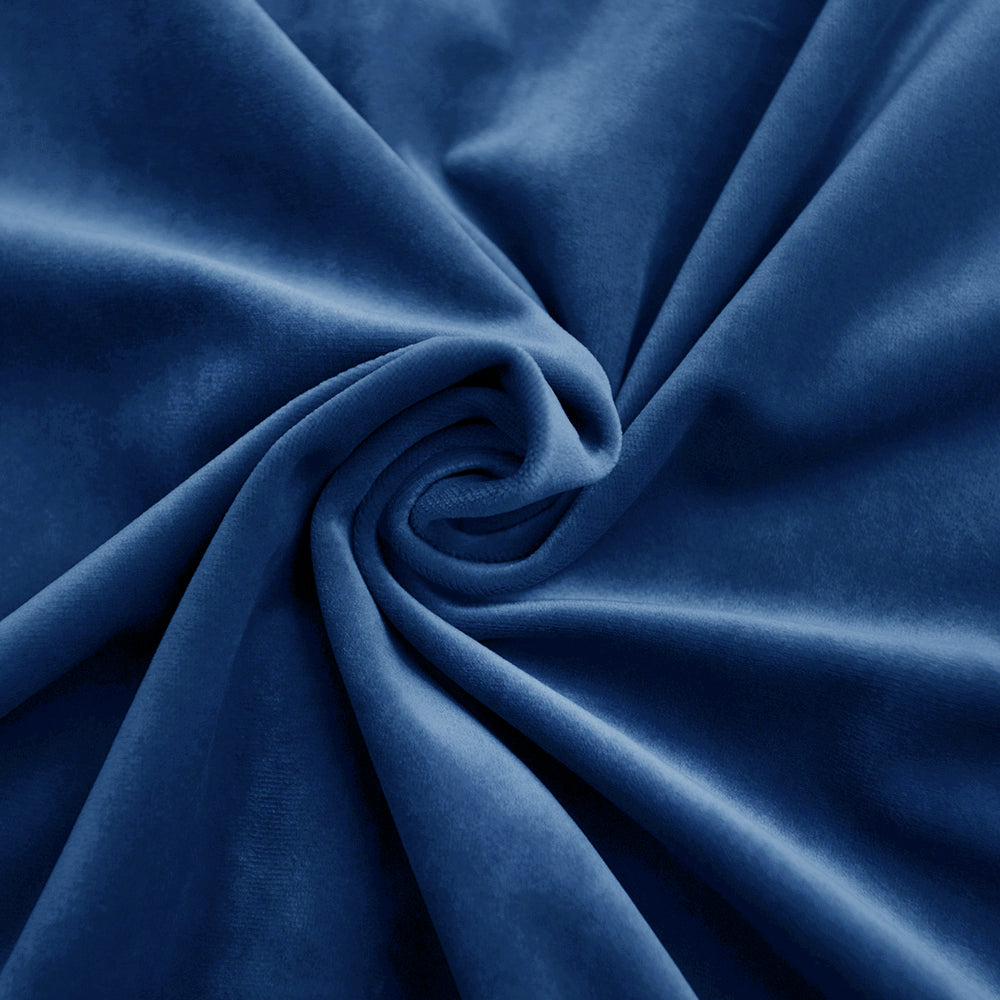 Close-up of royal blue velvet fabric swatch draped, showcasing its soft texture and luxurious sheen.