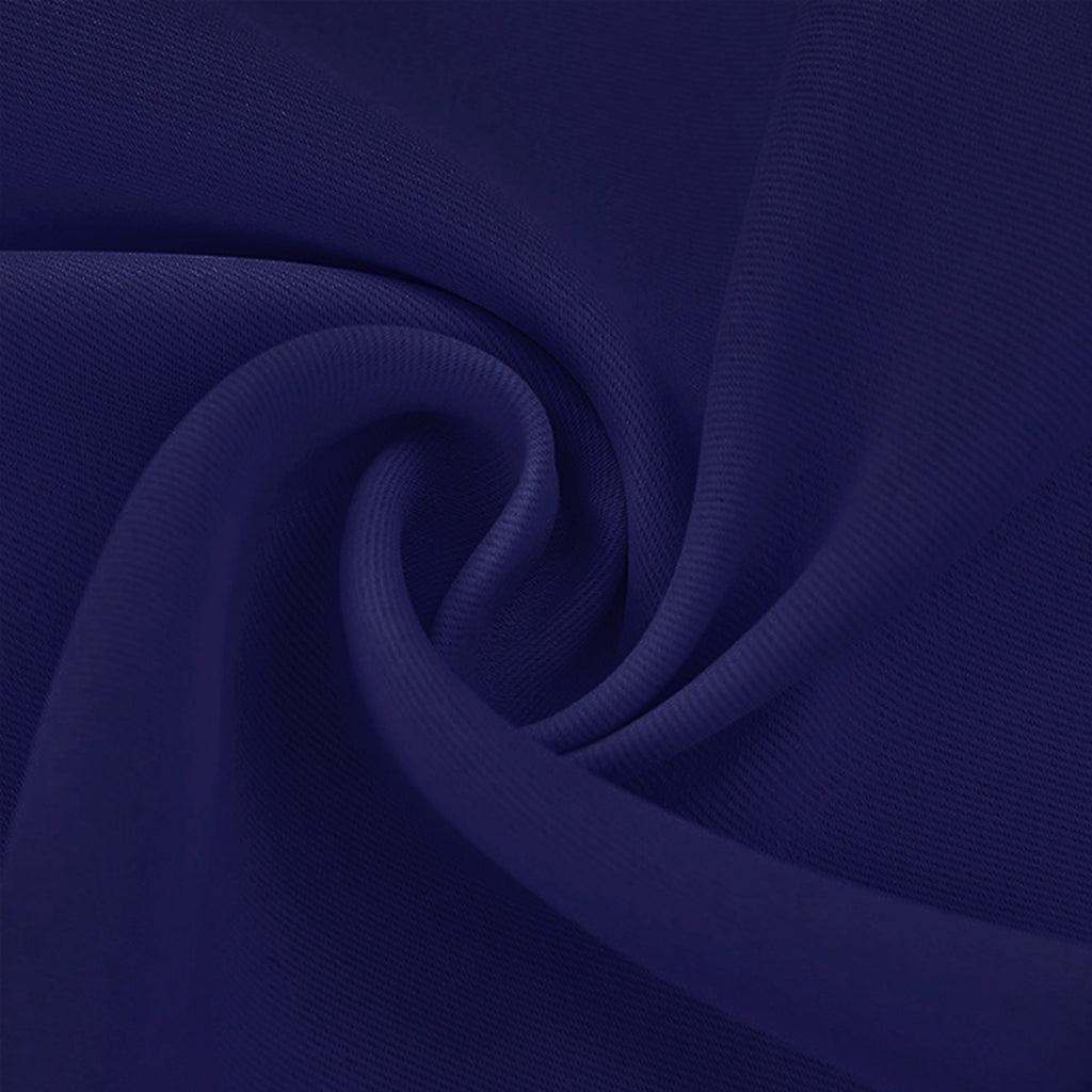 Close-up of a deep navy blue blackout fabric swatch, folded to showcase its smooth texture and quality material.