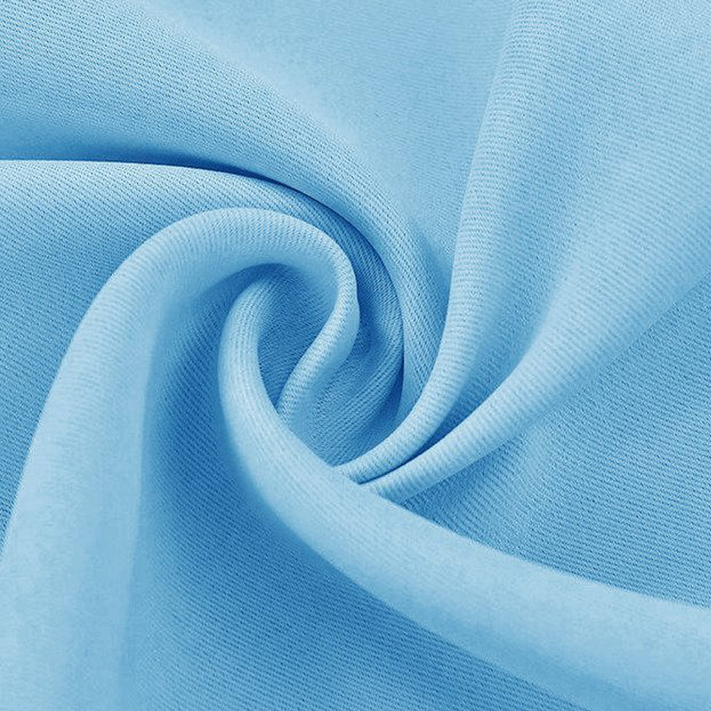 Detailed view of a light blue blackout fabric swatch, highlighting its smooth texture and subtle diagonal weave.