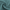 Close-up of a dark teal blackout fabric swatch, showing its soft folds, thick texture, and subtle diagonal weave.
