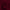 Close-up of a rich maroon blackout fabric swatch, showcasing its smooth yet structured woven texture and soft folds.