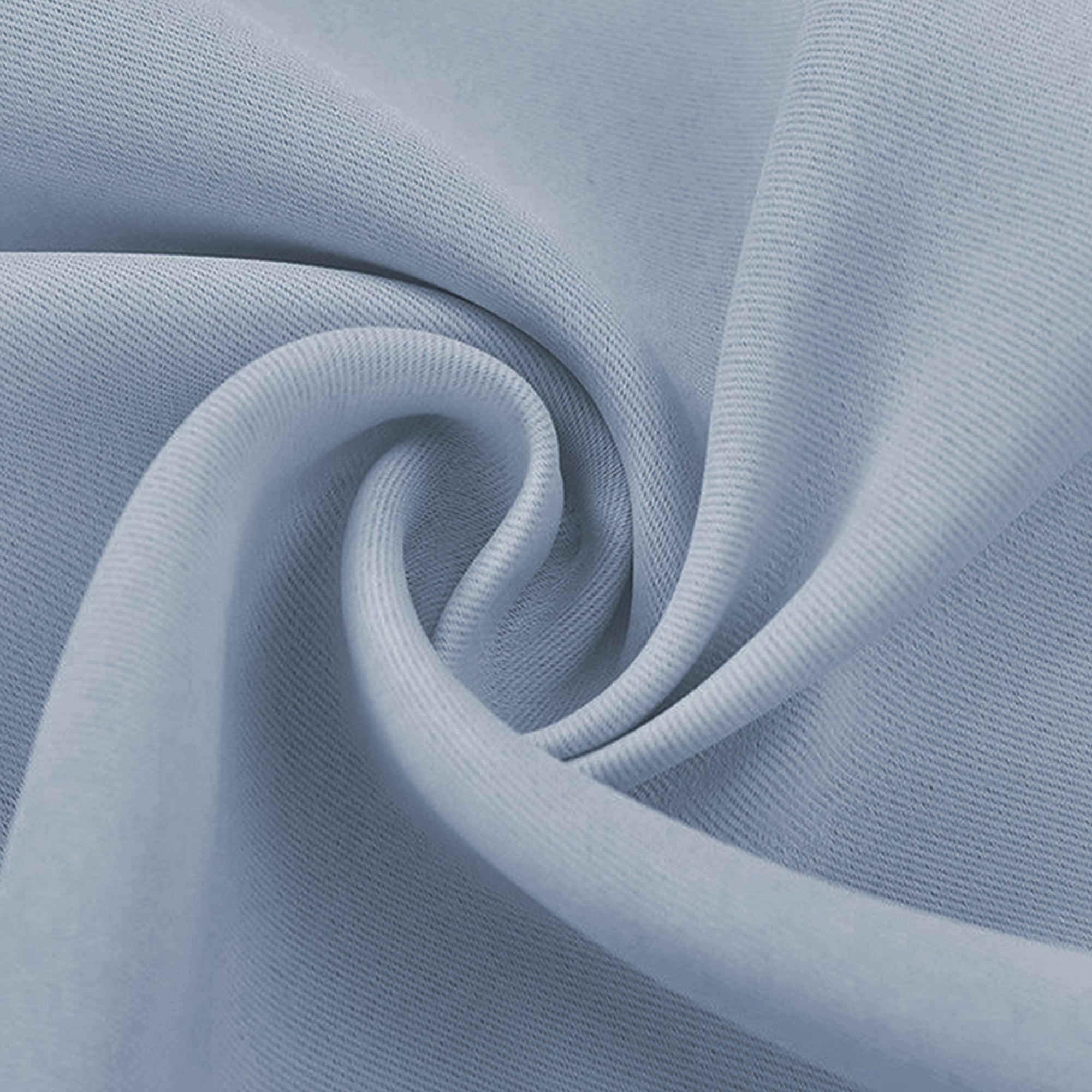 Light blue blackout fabric swatch in a close-up, revealing its fine weave, soft texture, and gentle folds.