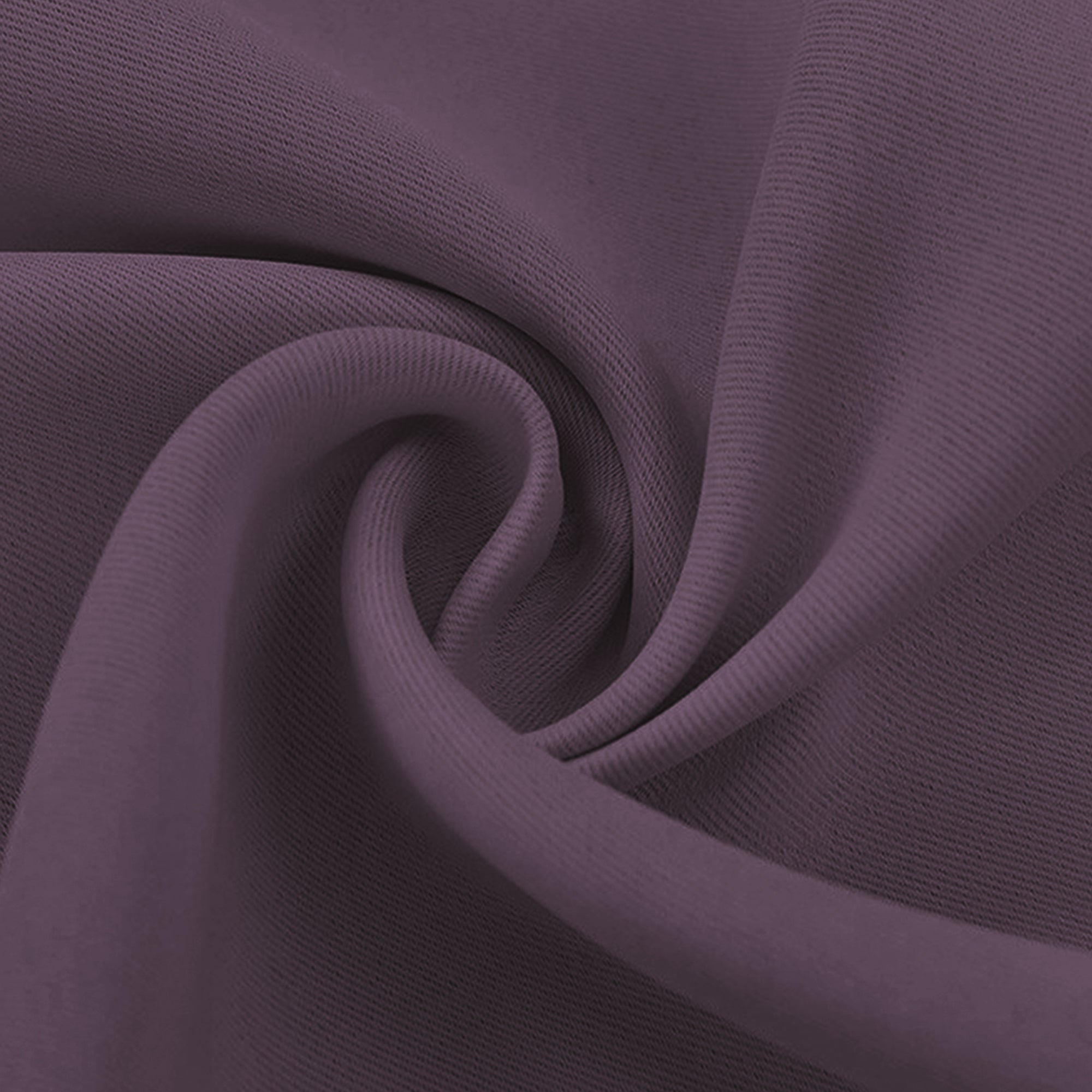 Close-up of a dark plum blackout fabric swatch, showing its woven texture and soft, elegant drape.