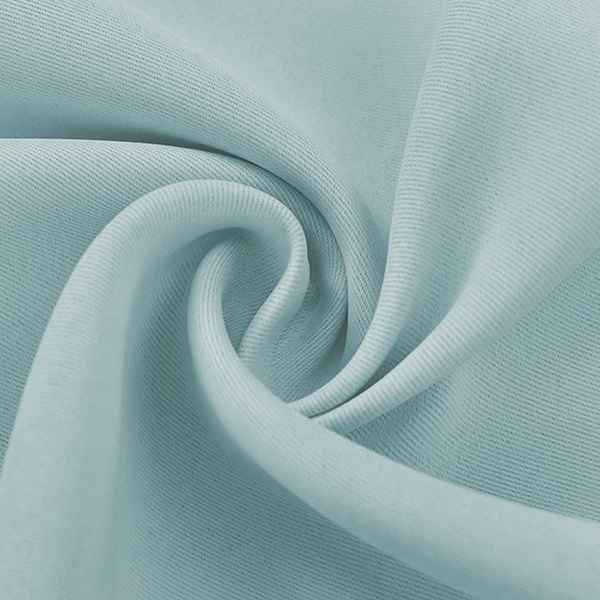 Close-up of a light blue blackout fabric swatch, showing its soft texture and gentle folds.