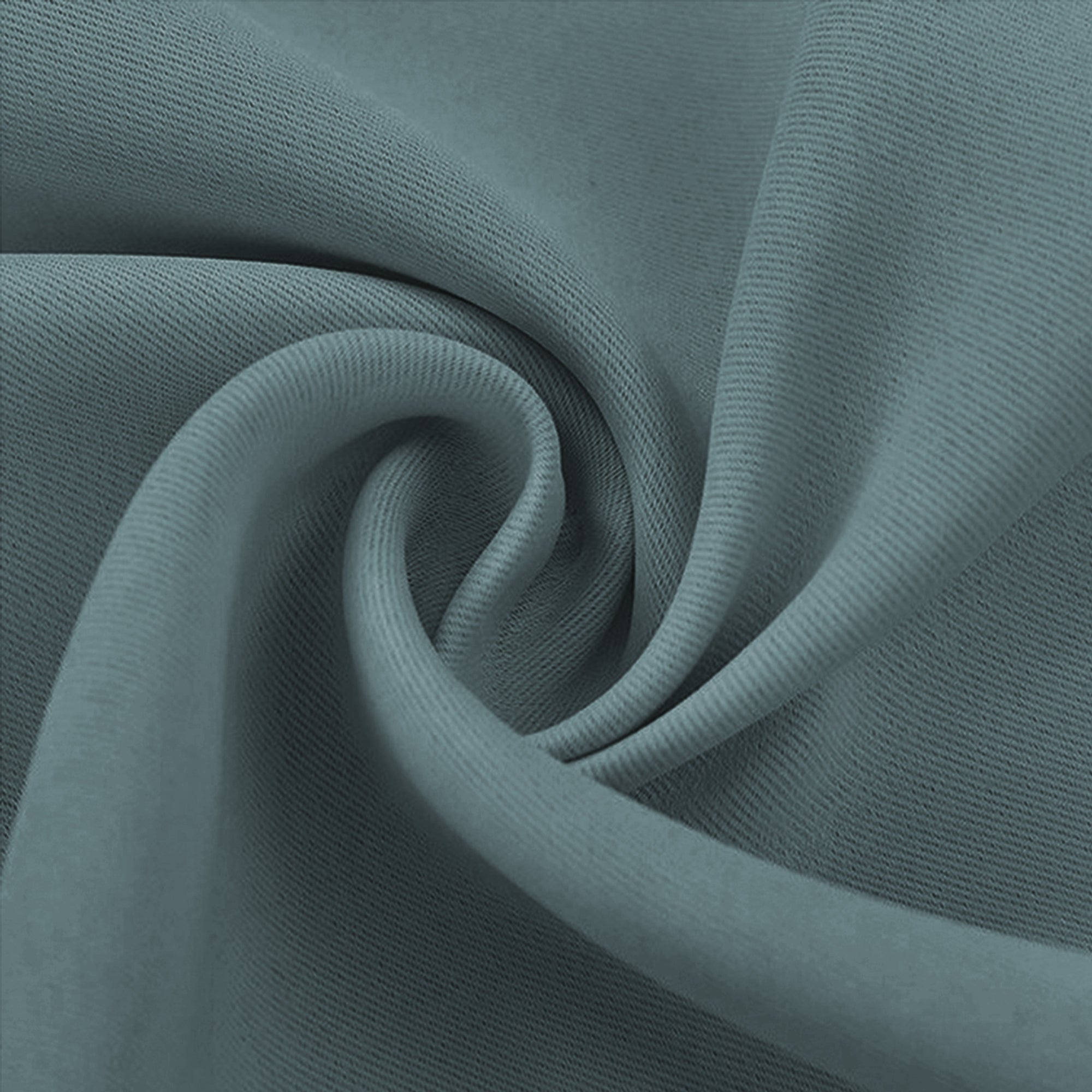 Close-up of a teal-grey blackout fabric swatch, highlighting its textured weave and soft, draped folds.