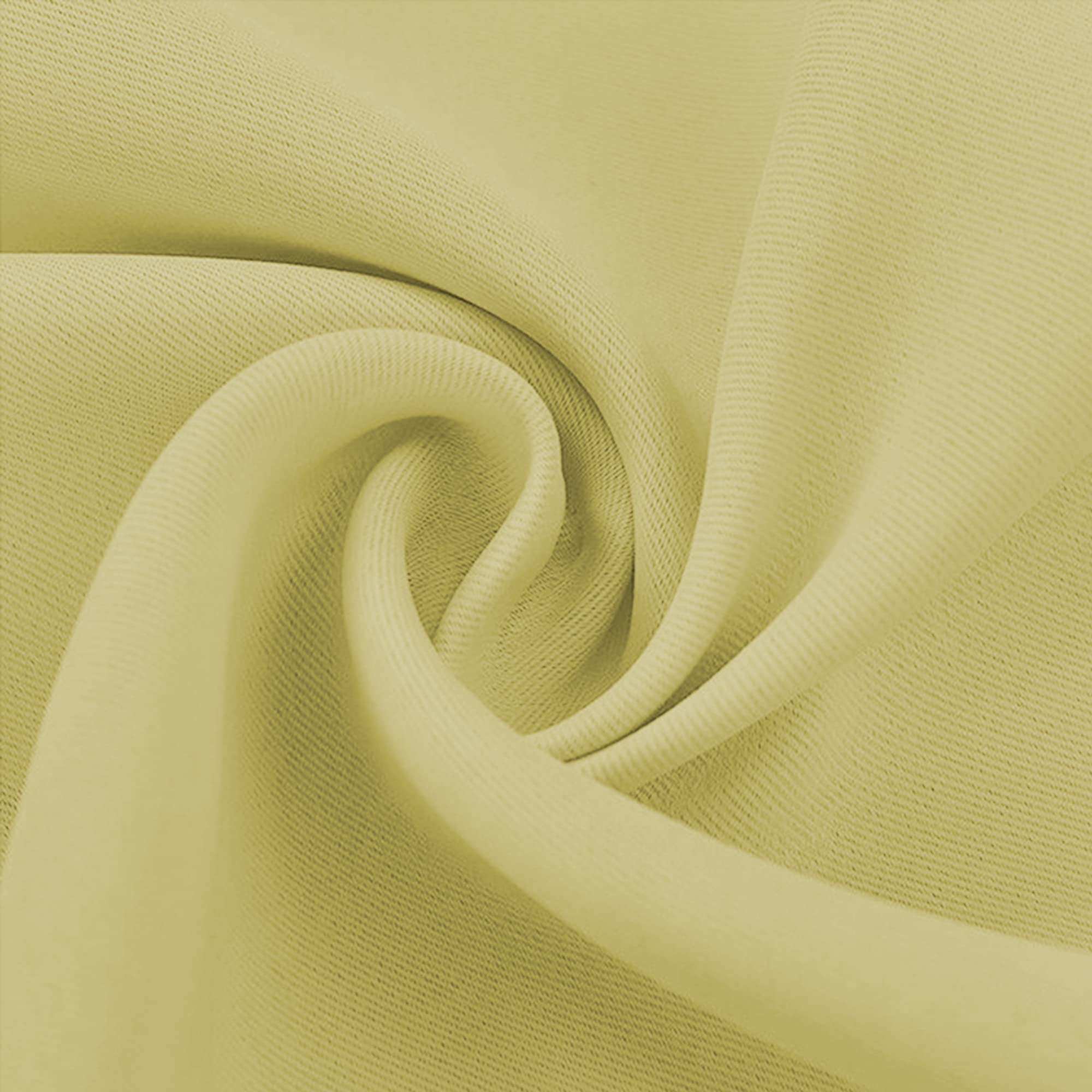 Close-up of a light yellowish-green blackout fabric swatch, showing its soft texture and subtle ribbed pattern in a swirl.