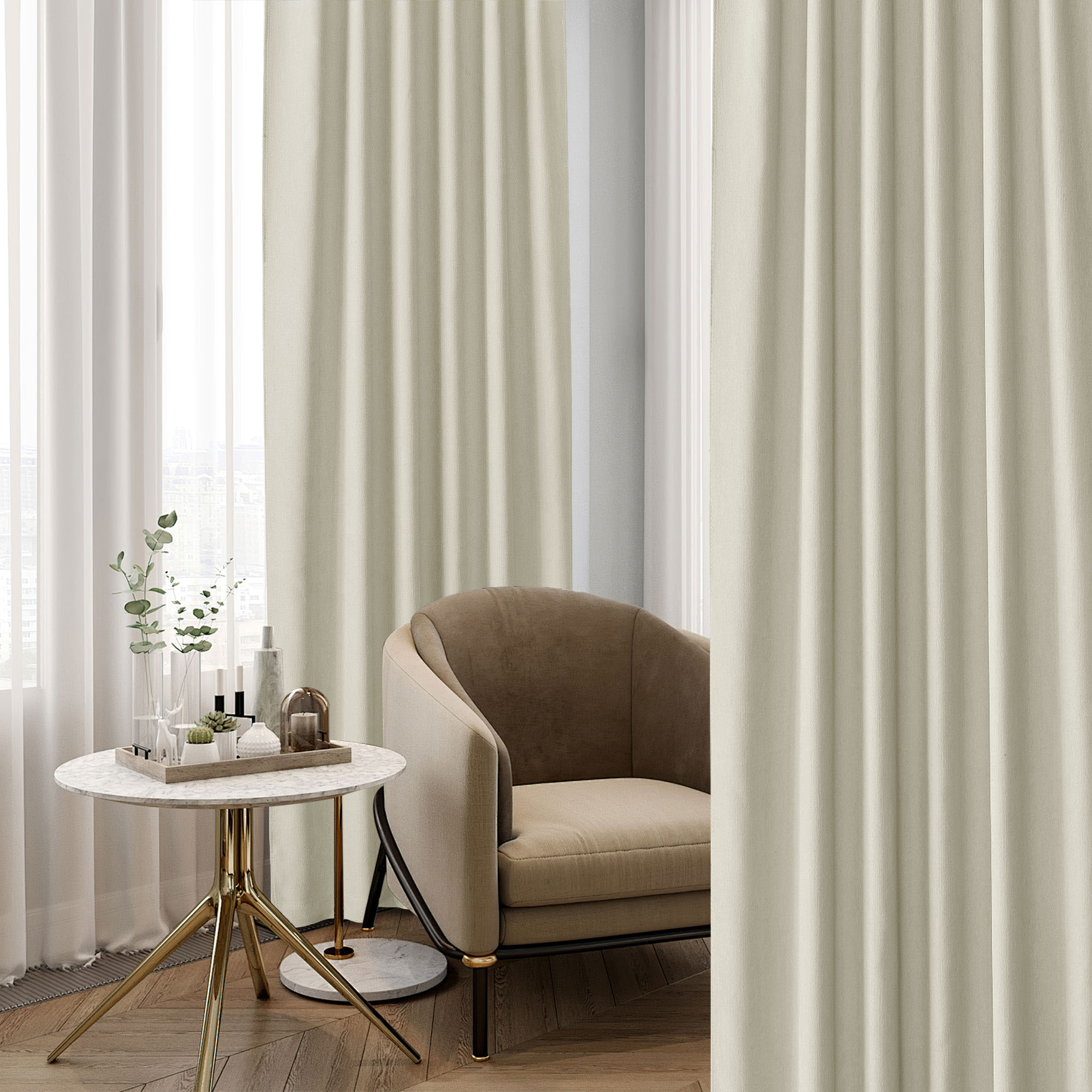 Light beige textured chenille blackout curtains hanging in a stylish living room with a neutral armchair and marble accent table.