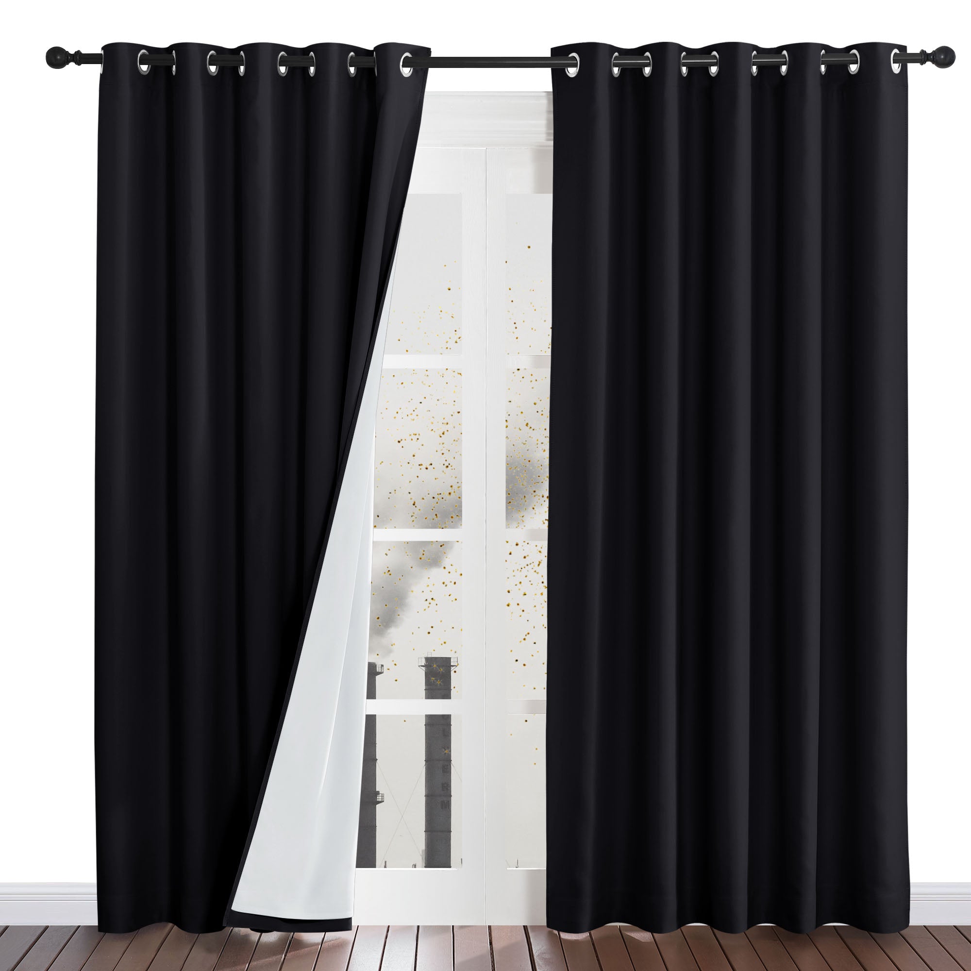 Black four-layer dustproof curtains with one panel pulled back to reveal the white liner blocking dust from the window.