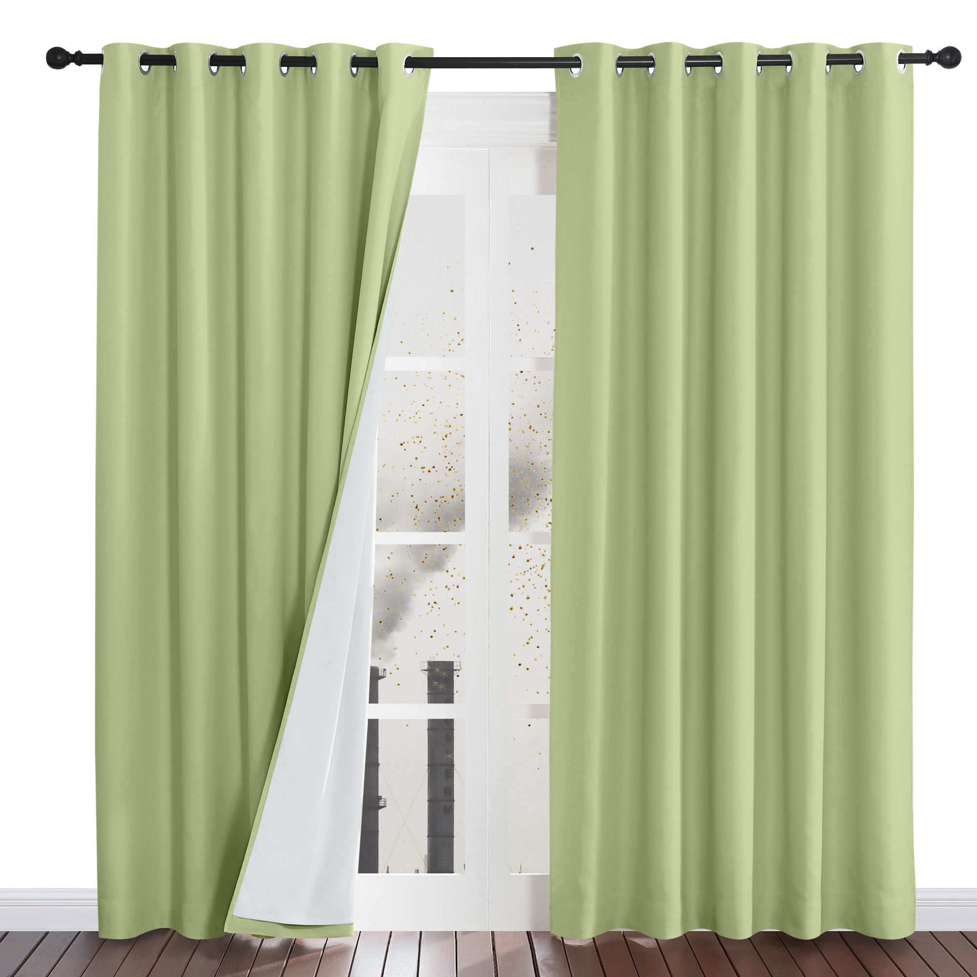 Green four-layer dustproof curtain panel pulled back to show the white inner lining and its construction against a window.