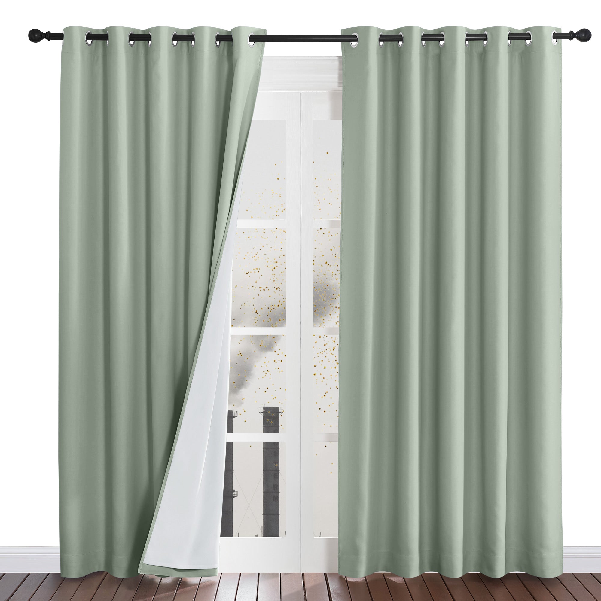 Sage green dustproof curtains hung on a rod, with one panel pulled back to reveal the protective white four-layer liner.