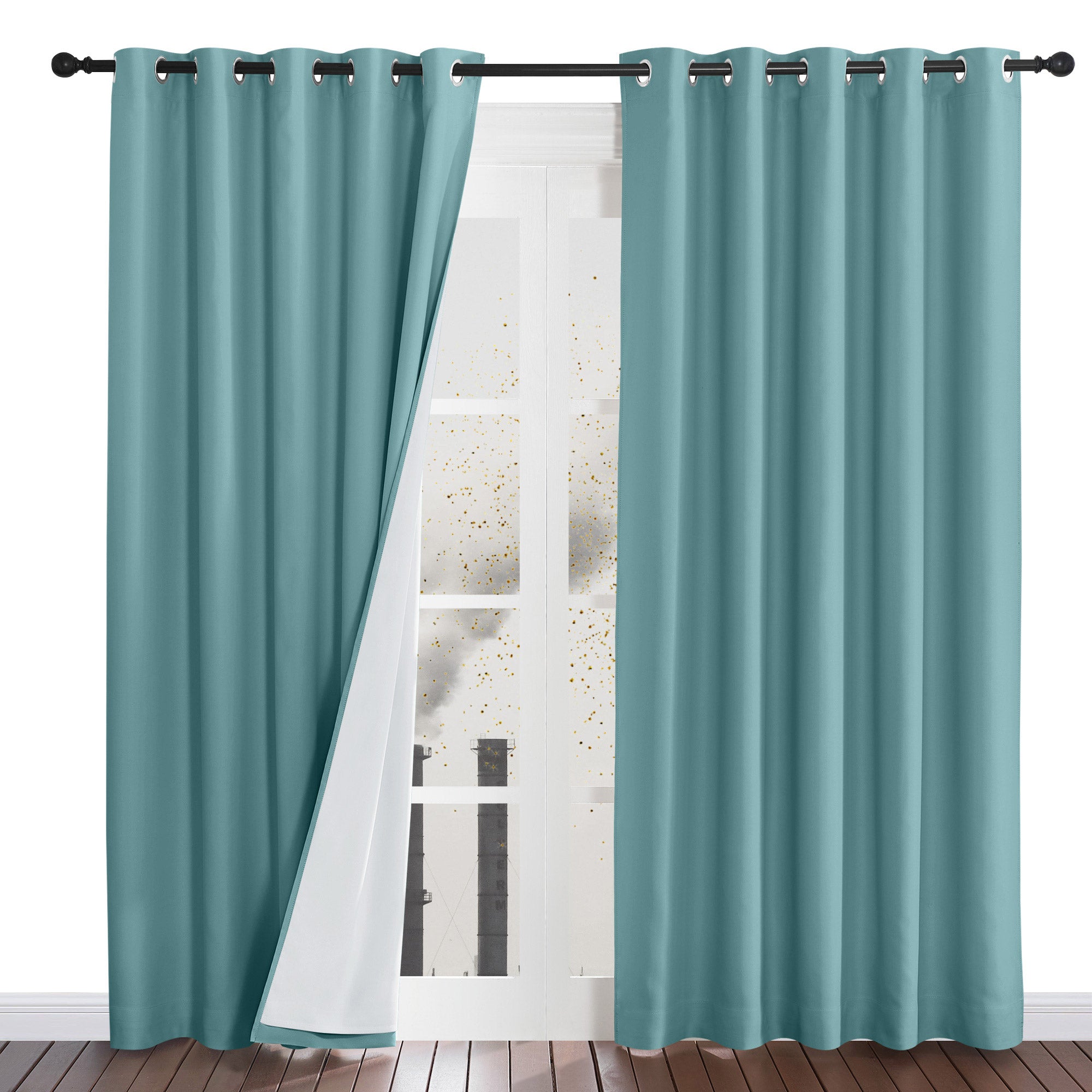 A pair of teal grommet curtains with one panel pulled back to reveal the four-layer dustproof white lining.