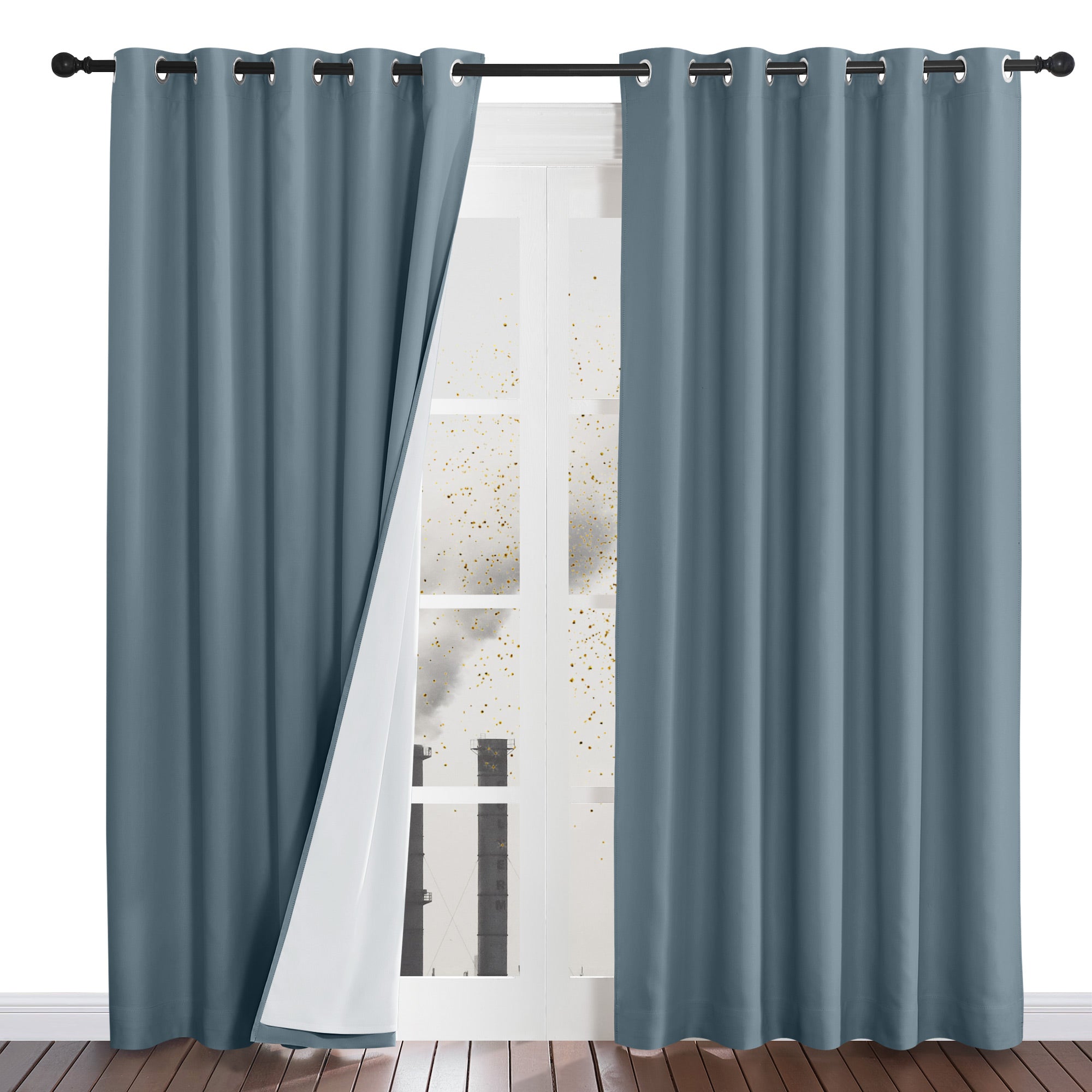 Blue-grey four-layer dustproof curtains with one panel pulled aside to reveal the white liner blocking outside dust.