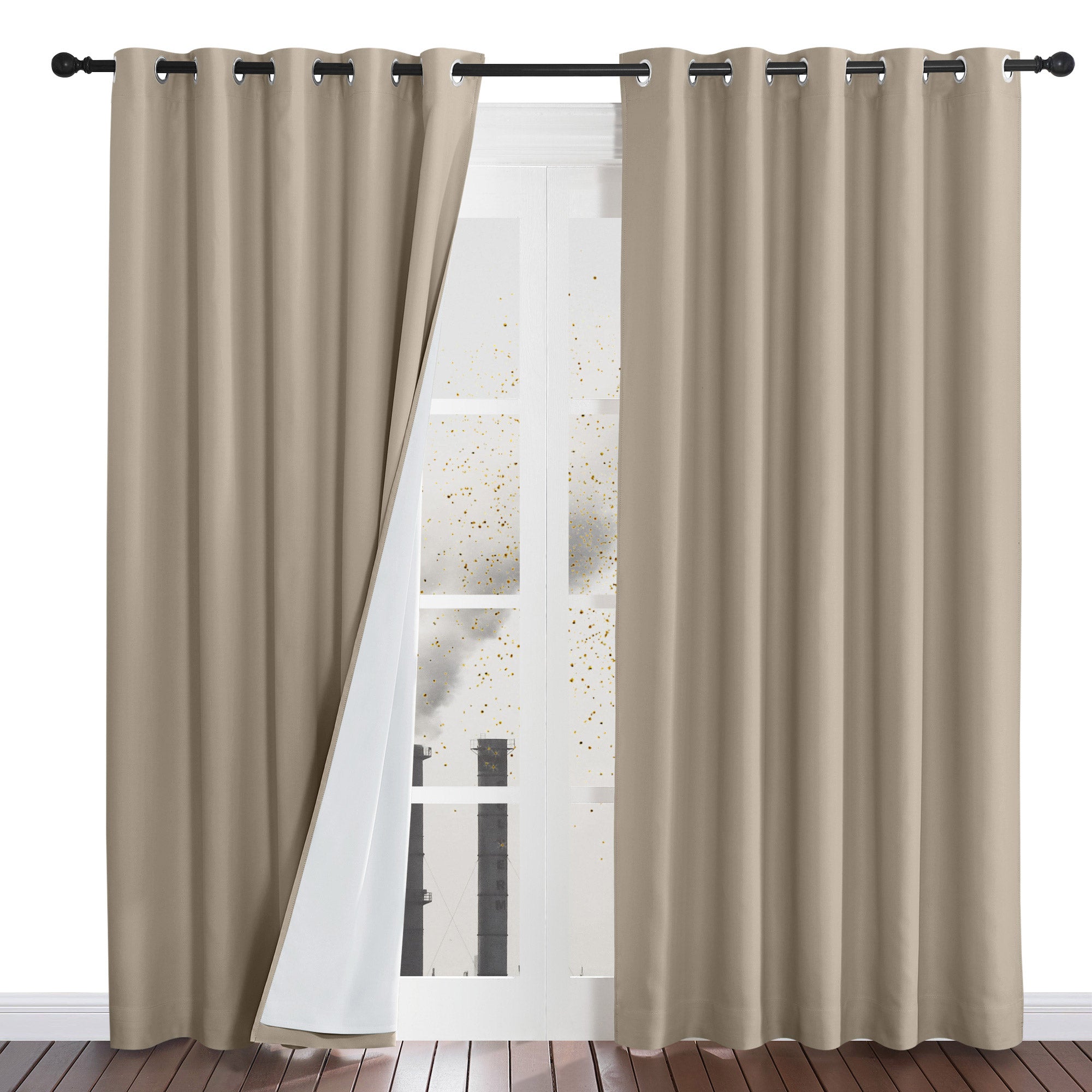 Beige four-layer dustproof curtains on a rod, with one panel pulled back to reveal the protective white inner liner.