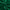 Close-up of rich emerald green velvet fabric swirled to highlight its luxurious texture and beautiful sheen.