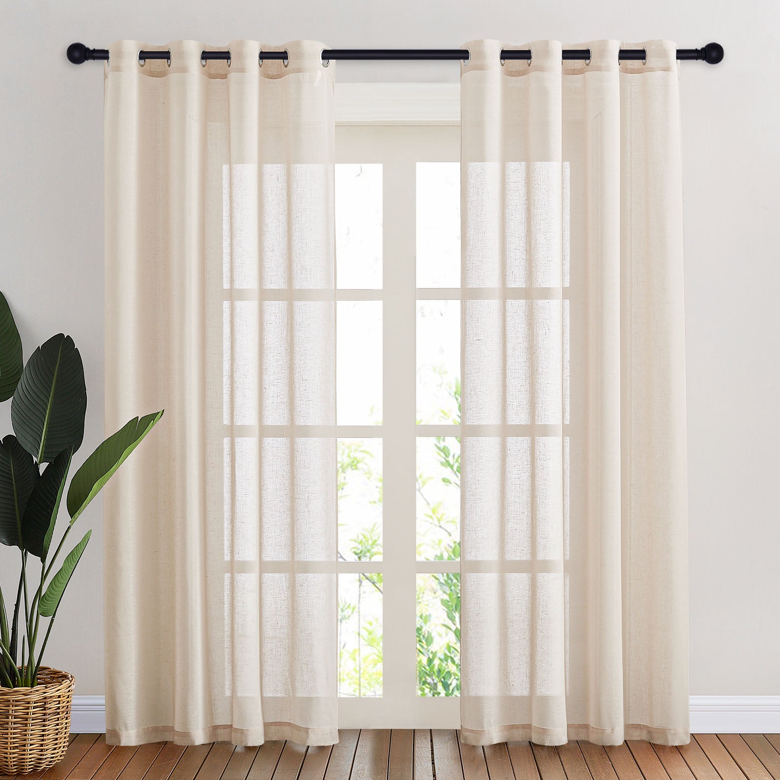 Semi-sheer faux linen curtains in a natural color hanging on a grommet rod, balancing light and privacy in a room.