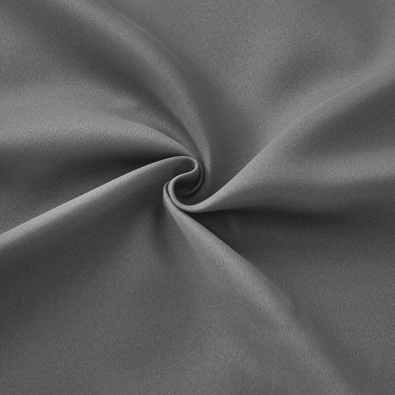 Close-up of dark grey flame retardant curtain fabric, showcasing its soft texture and elegant folds.