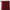 Close-up of a deep red flame retardant curtain showing pinch pleat heading and fabric texture on a black rod.