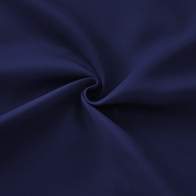 Close-up of dark blue flame retardant curtain fabric, showing soft folds and subtle texture of the material.