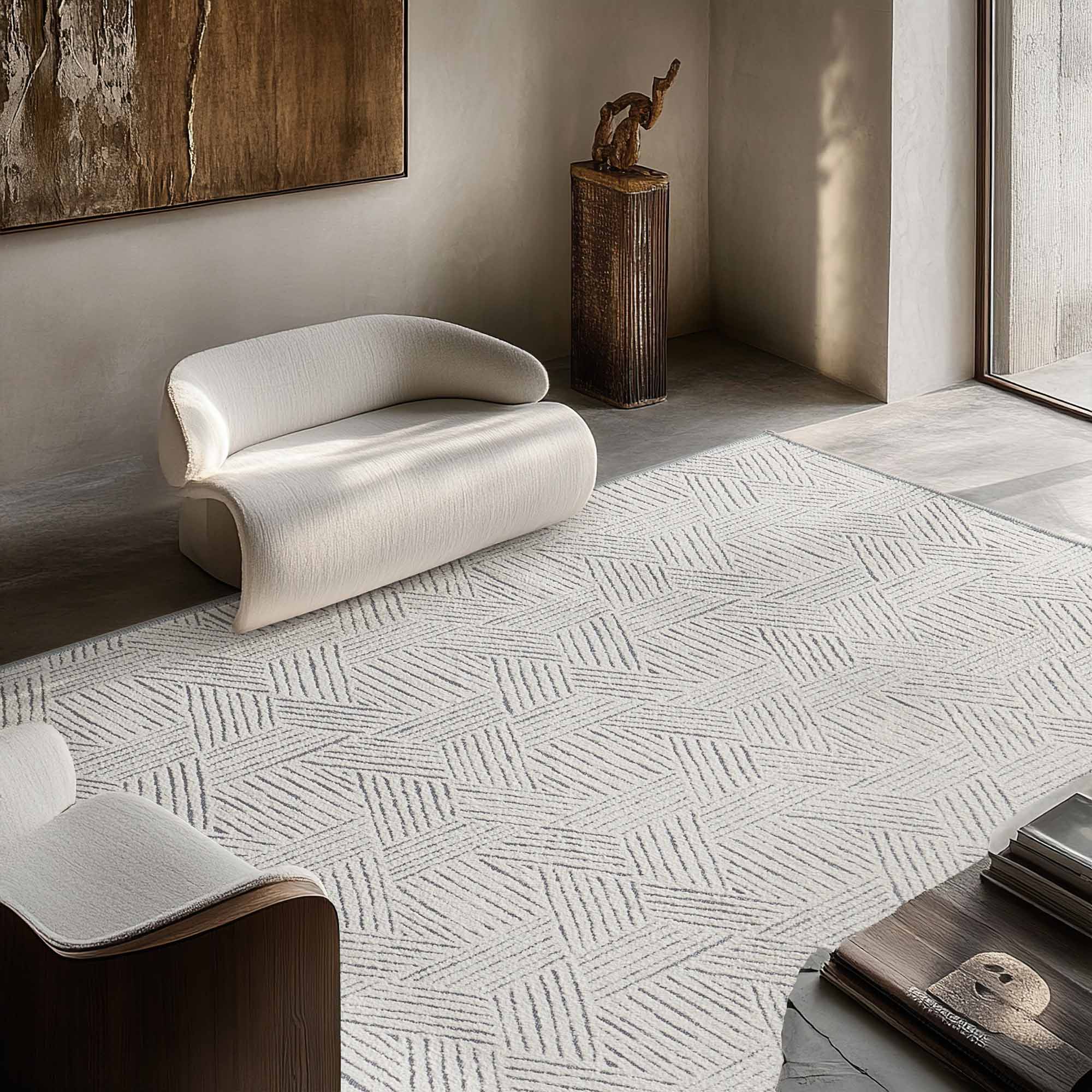 Jacquard Chenille area rug in light tones featuring a modern dashed-line hexagon pattern on a concrete floor in a bright living room.