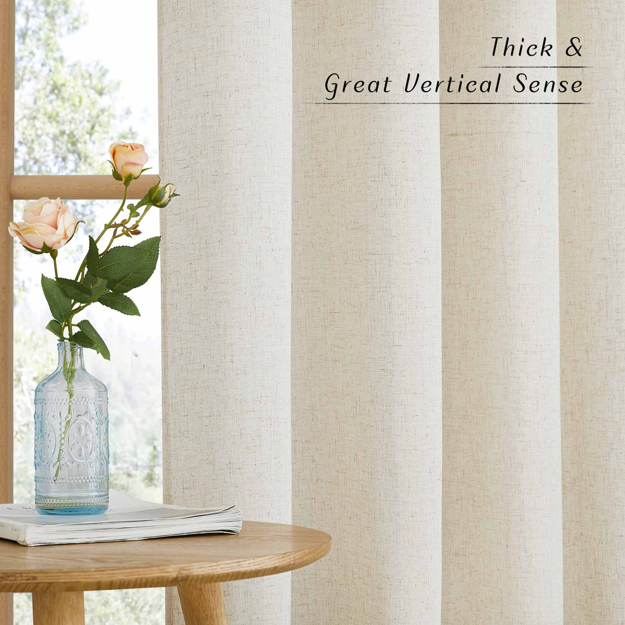 Close-up of thick, natural linen curtains showing the detailed woven texture and heavy vertical drape next to a window.