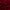 Close-up of a dark red velvet fabric swatch, richly textured and softly draped, highlighting its luxurious pile.