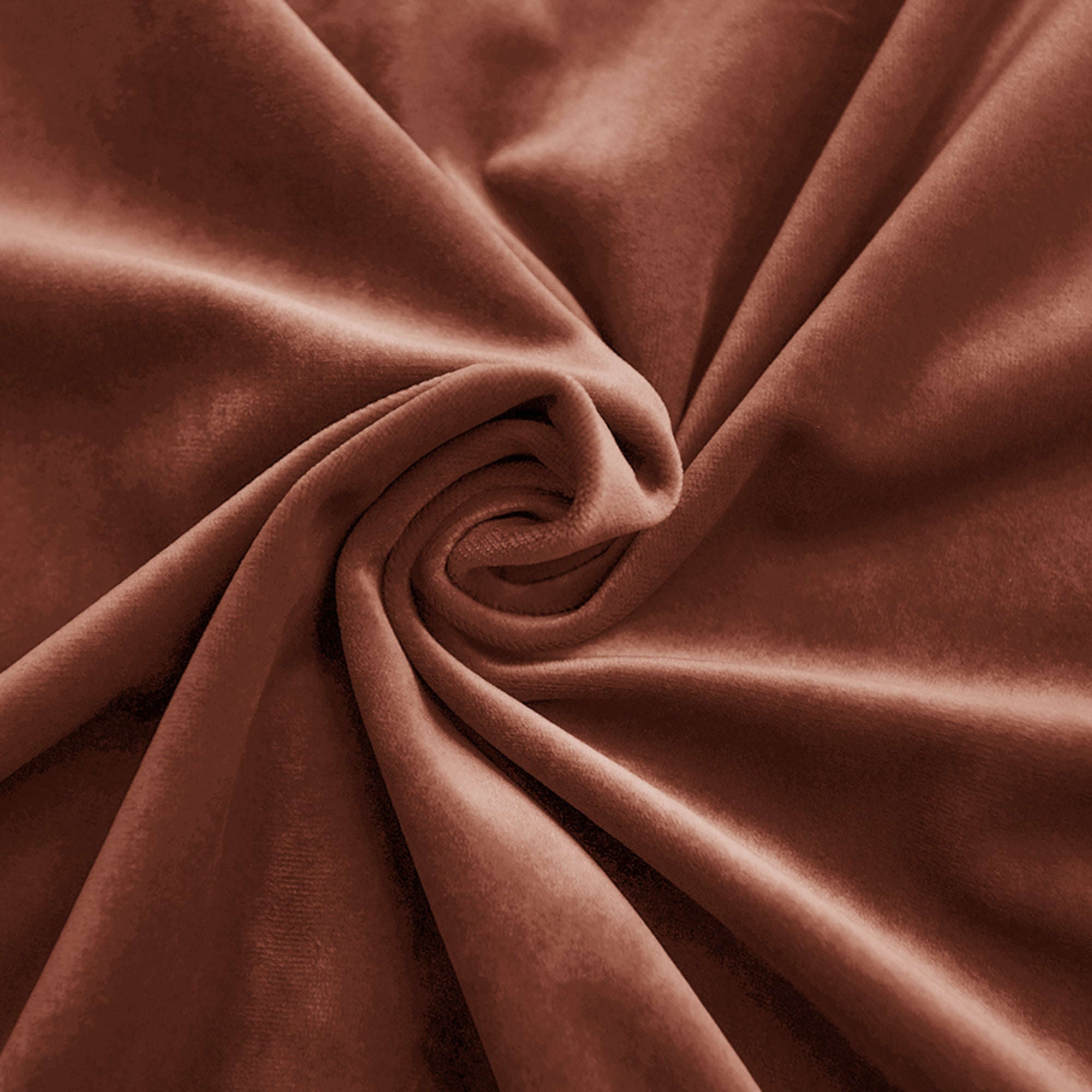 Close-up of brown velvet fabric swirled to highlight its soft texture and luxurious sheen, ideal for swatches.