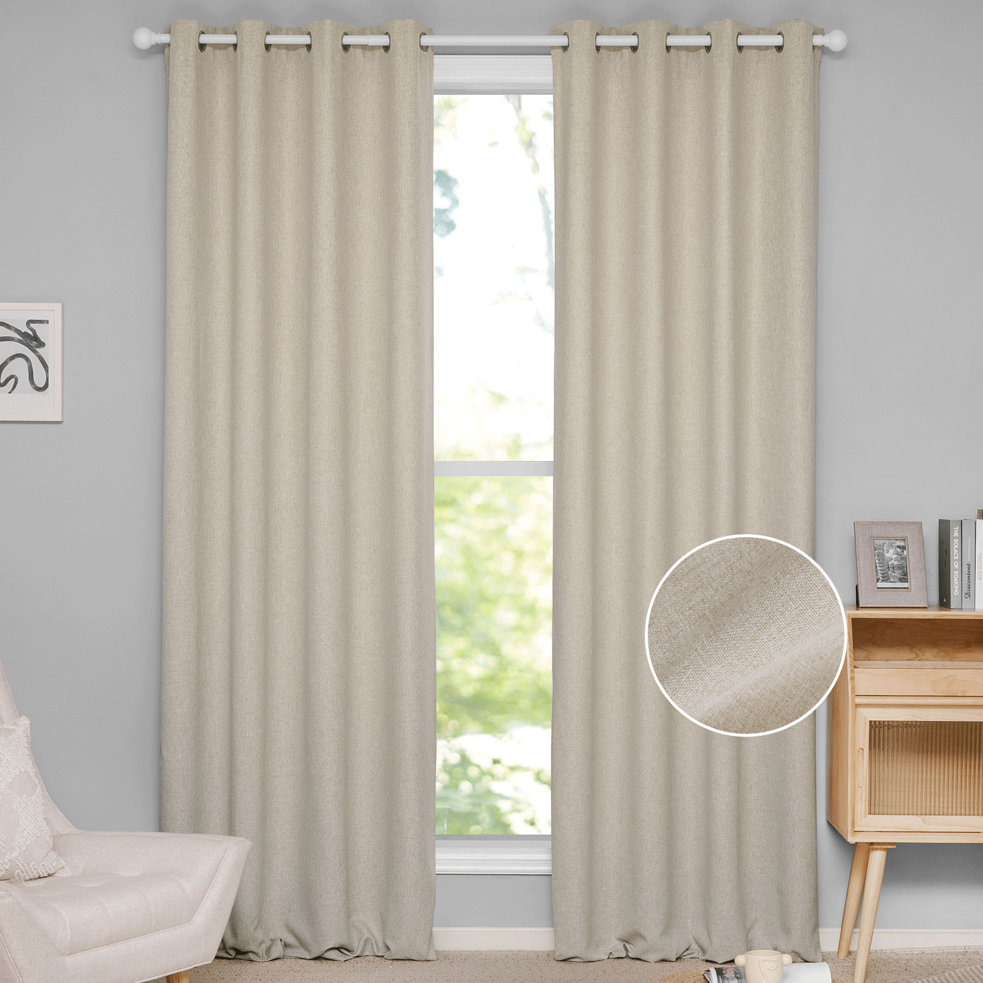 Natural beige cotton linen curtains with grommet tops hanging in a living room window. Inset shows soft fabric texture.