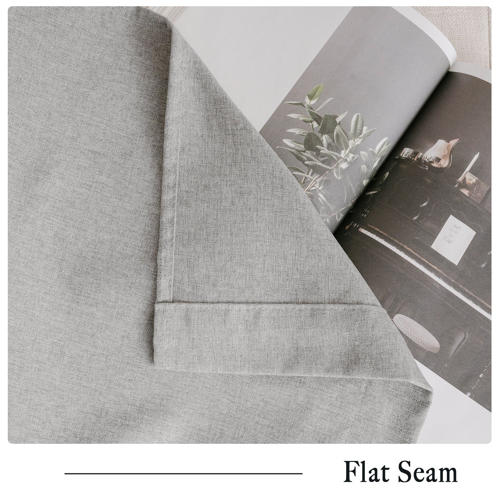 Soft grey cotton linen curtain fabric detail, highlighting the neat flat seam. Shows quality craftsmanship.