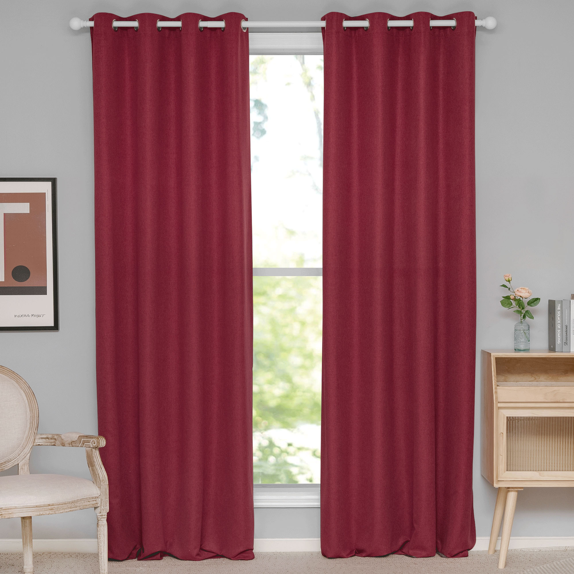 Burgundy soft cotton linen grommet top curtains fully drawn across a window, highlighting their rich color and textured fabric.