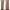 Brown grommet top blackout curtains, one panel slightly open, hangs on a black rod over a window with a view of trees.