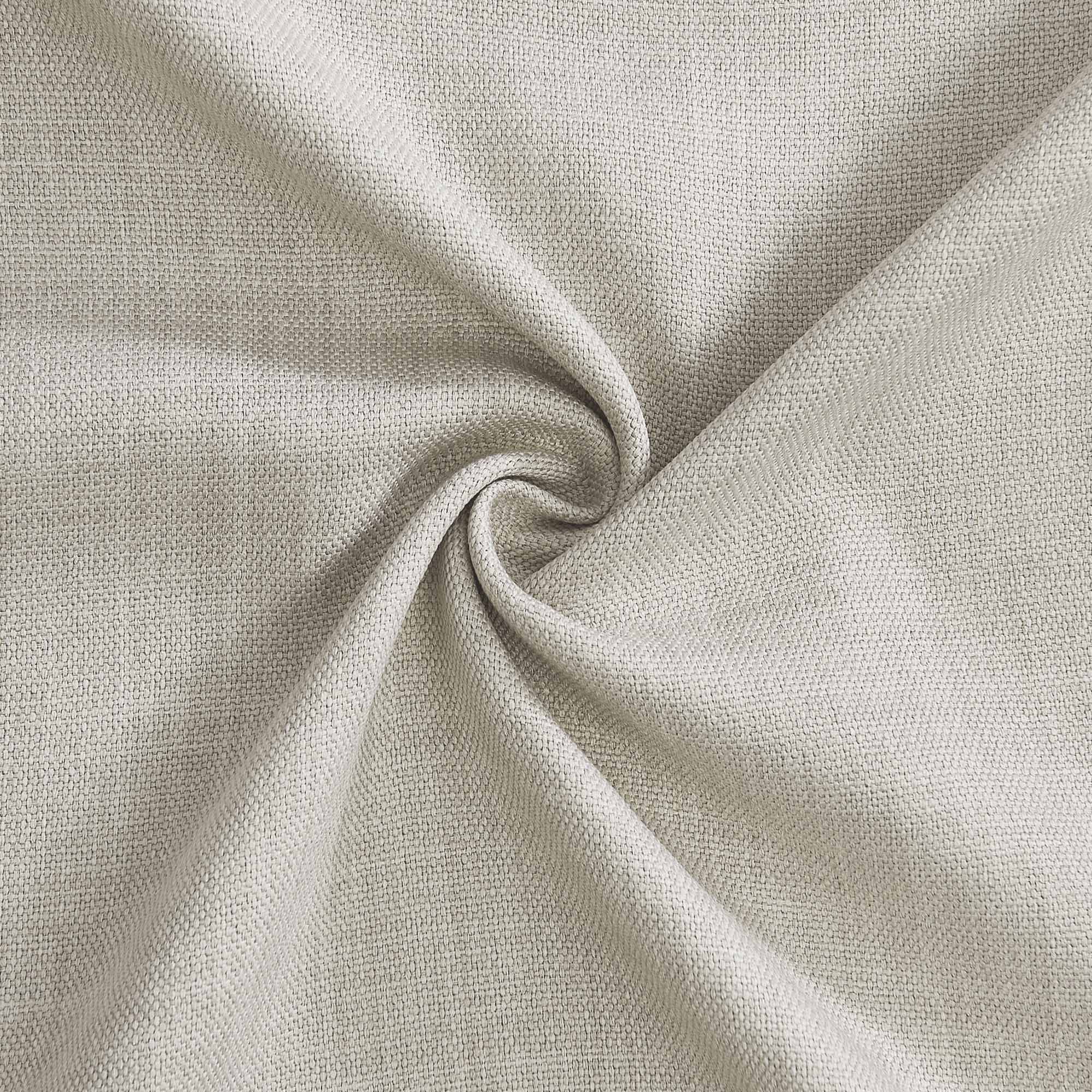 Detailed close-up of a light neutral woven tablecloth fabric, highlighting its textured surface and gentle folds.