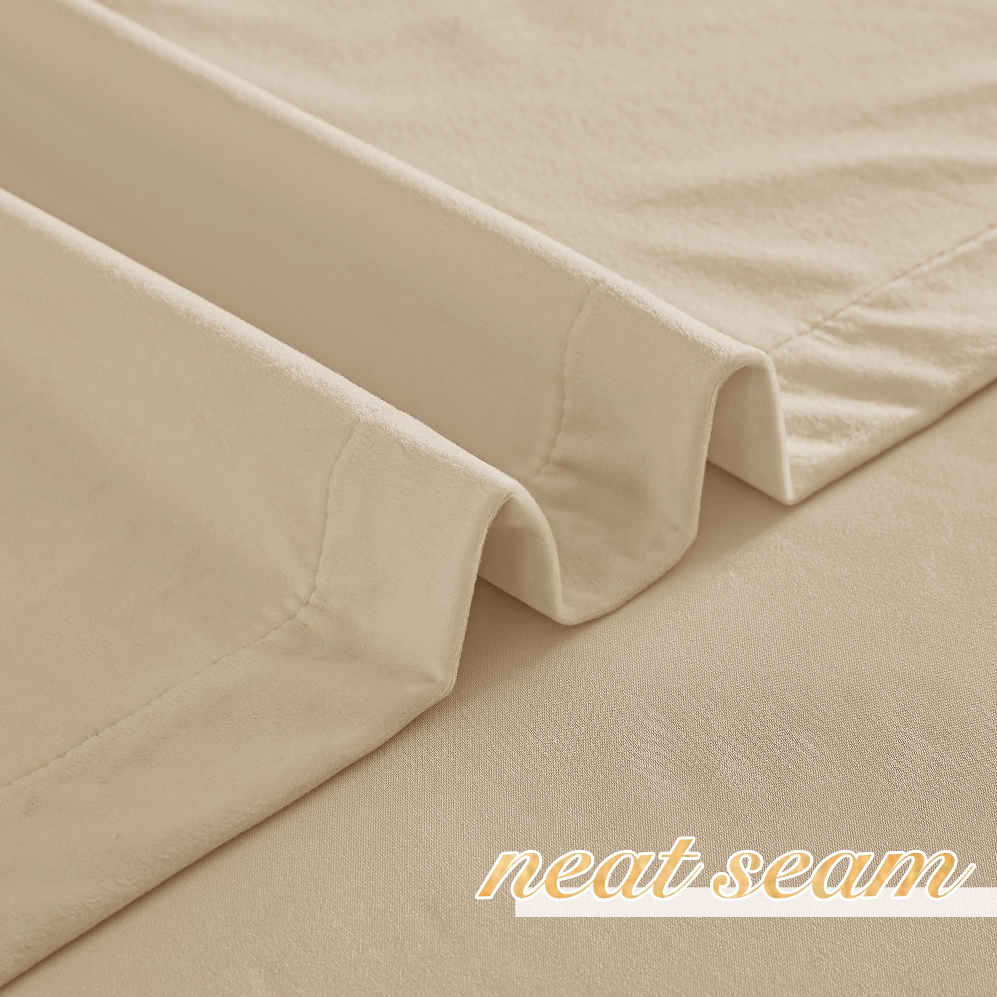 Close-up of a soft beige velvet curtain, showing the neatly stitched hem and plush fabric.