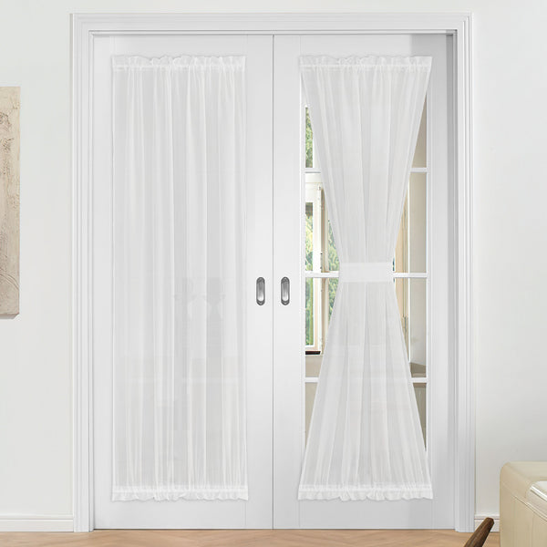 White voile sheer door curtains on French doors; one hangs freely, the other is tied back to demonstrate versatility.