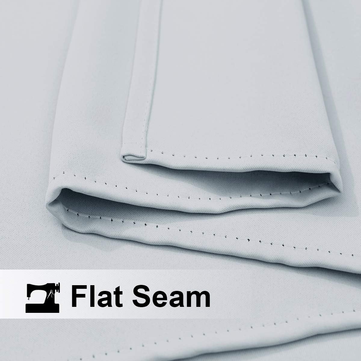 Close-up of a flat seam on the light gray waterproof outdoor curtain fabric, showing durable stitching details.