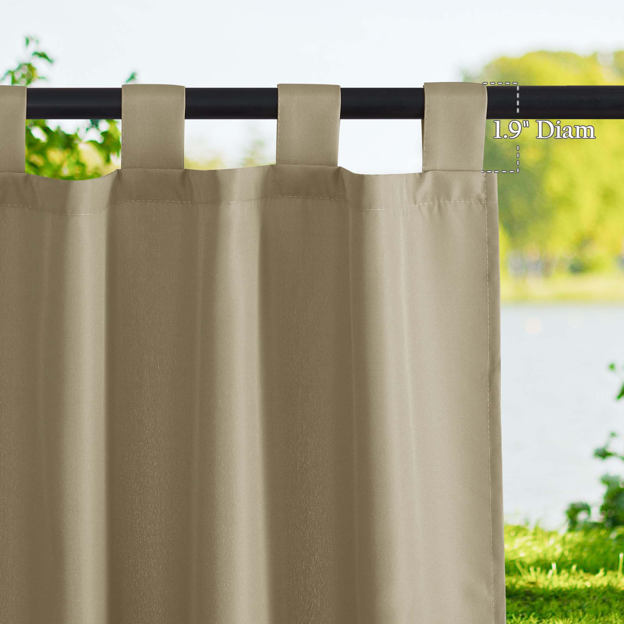 Tan waterproof canvas outdoor curtain with tab top loops on a black rod, highlighting 1.9" rod diameter compatibility.