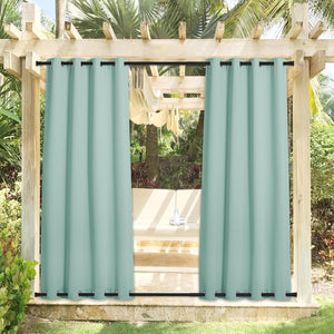 Pair of aqua outdoor curtains with black grommets on top and bottom, hanging from a wooden pergola.
