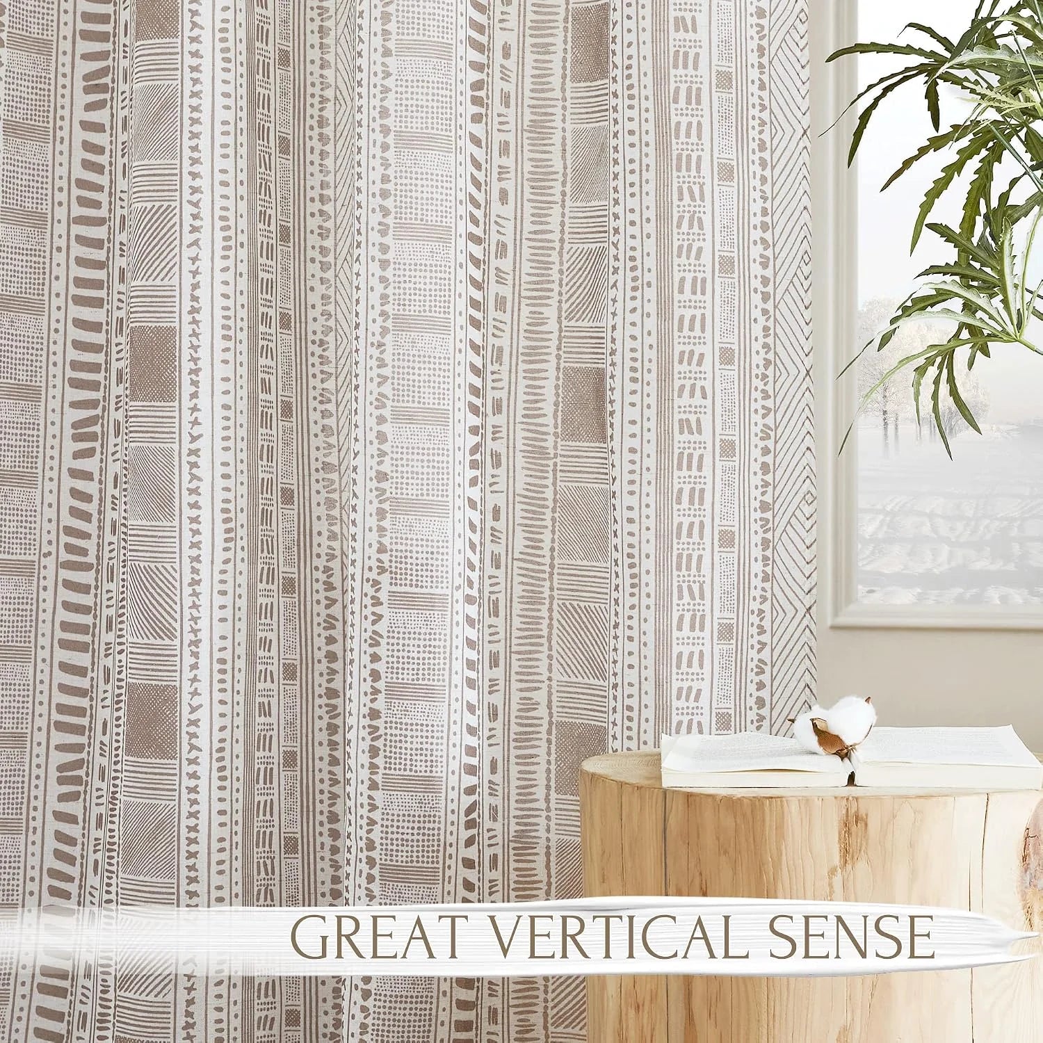 Beige boho patterned sheer curtain with vertical tribal stripes in a light neutral room