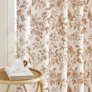 Beige linen curtains with a vintage brown floral rose pattern, beautifully draped by a sunlit window.