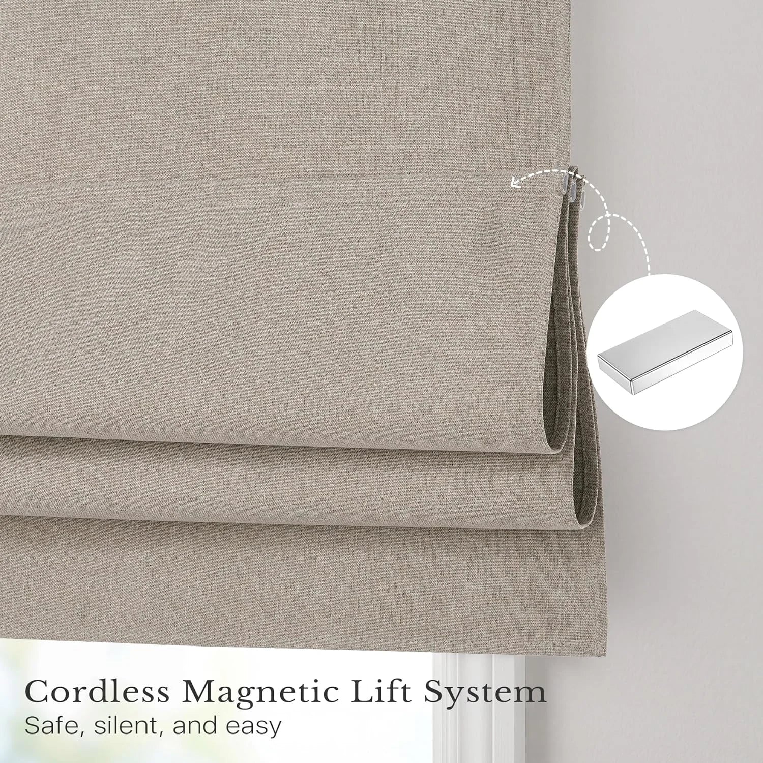 Beige woven fabric cordless Roman blind with a close-up of its magnetic lift system.